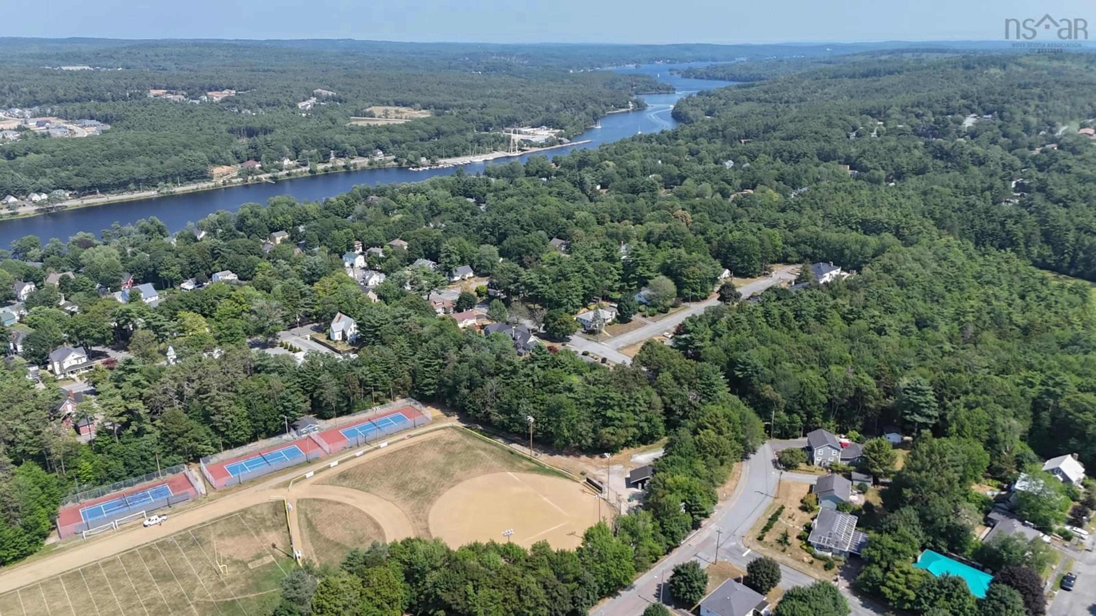 A pic from outside/outdoor area/front of a property/back of a property/a pic from drone, water/lake/river/ocean view for 141 Crescent St, Bridgewater Nova Scotia B4V 1K9