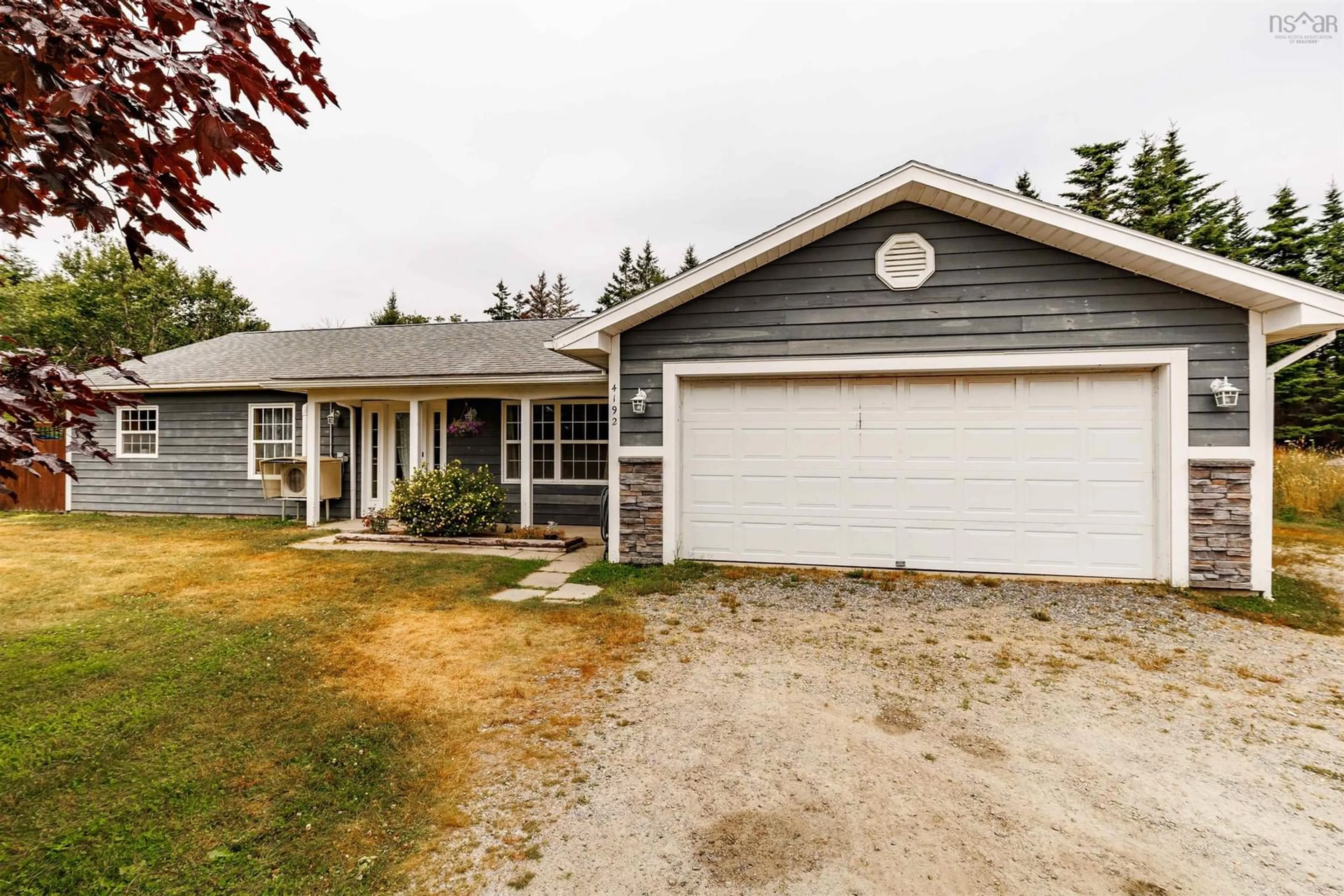 A pic from outside/outdoor area/front of a property/back of a property/a pic from drone, street for 4192 Highway 3 Hwy, Doctors Cove Nova Scotia B0W 1G0