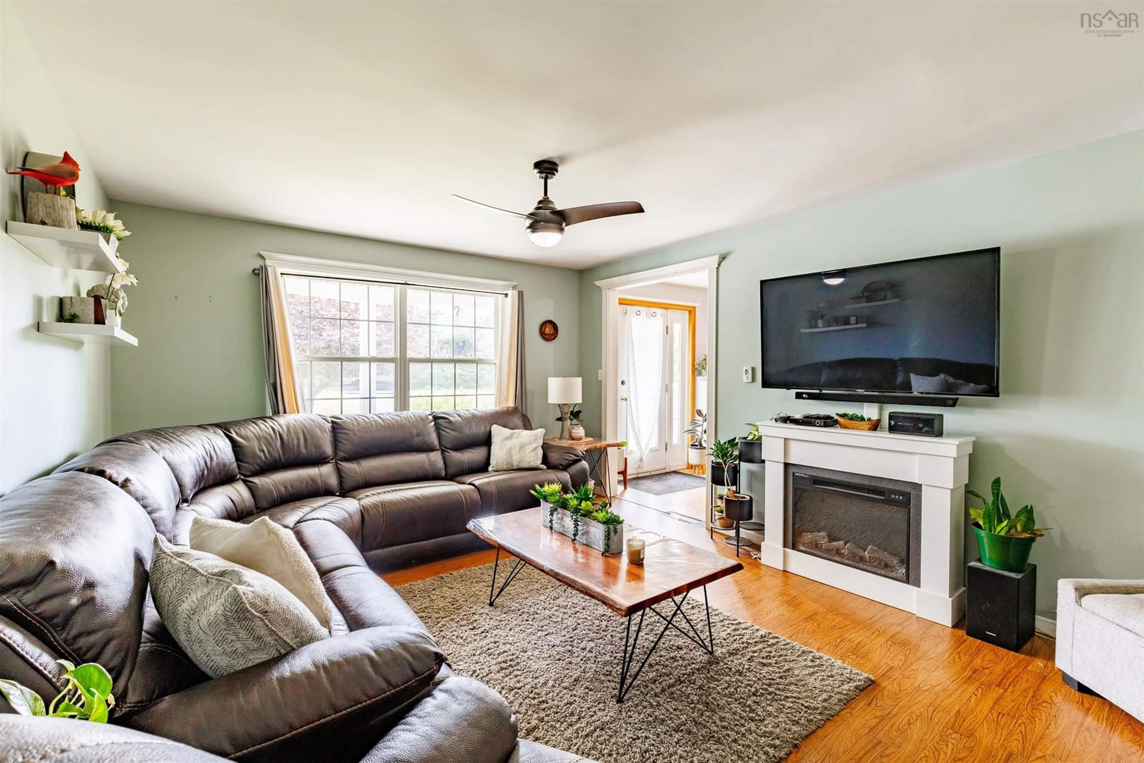 Living room with furniture, wood/laminate floor for 4192 Highway 3 Hwy, Doctors Cove Nova Scotia B0W 1G0