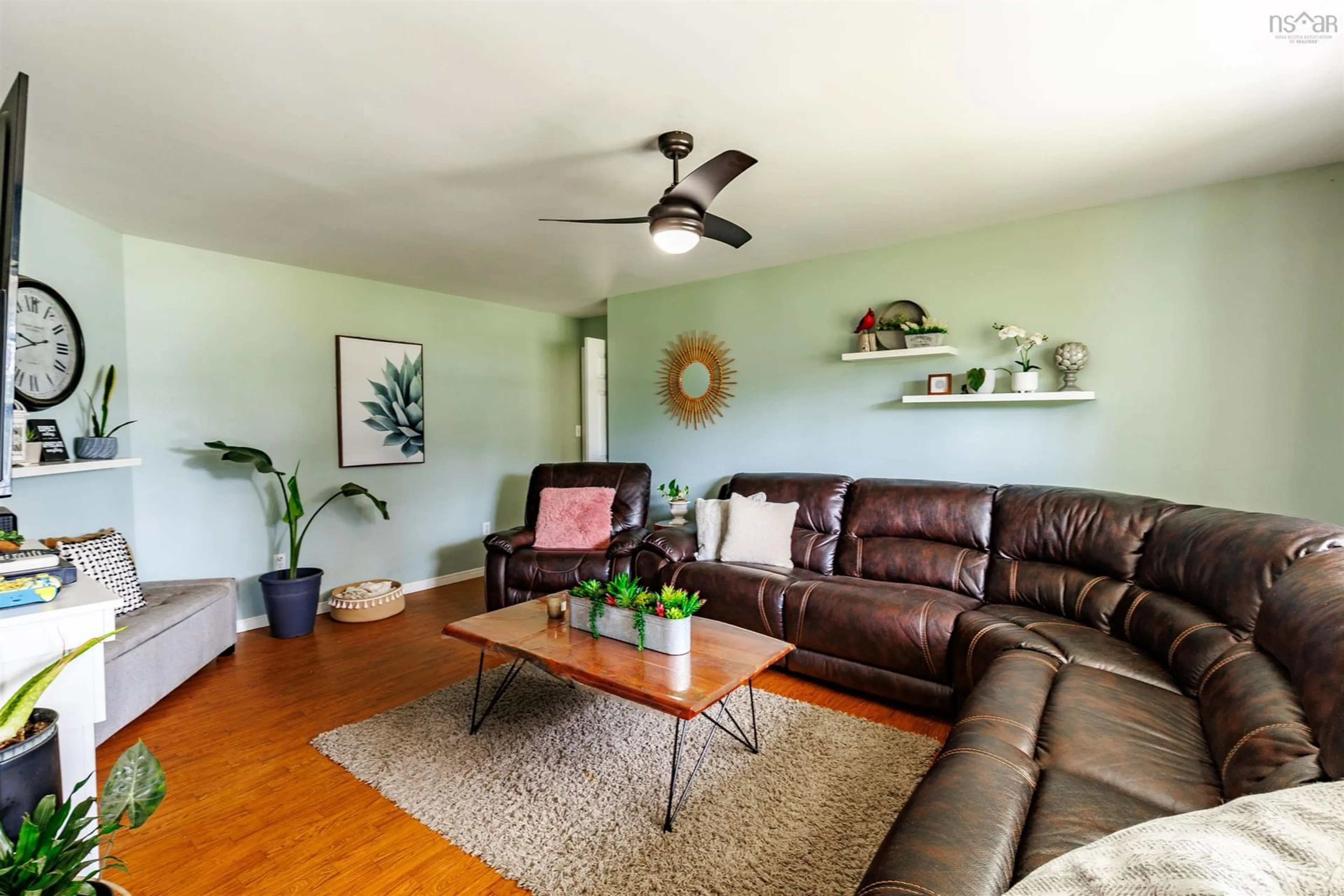Living room with furniture, wood/laminate floor for 4192 Highway 3 Hwy, Doctors Cove Nova Scotia B0W 1G0
