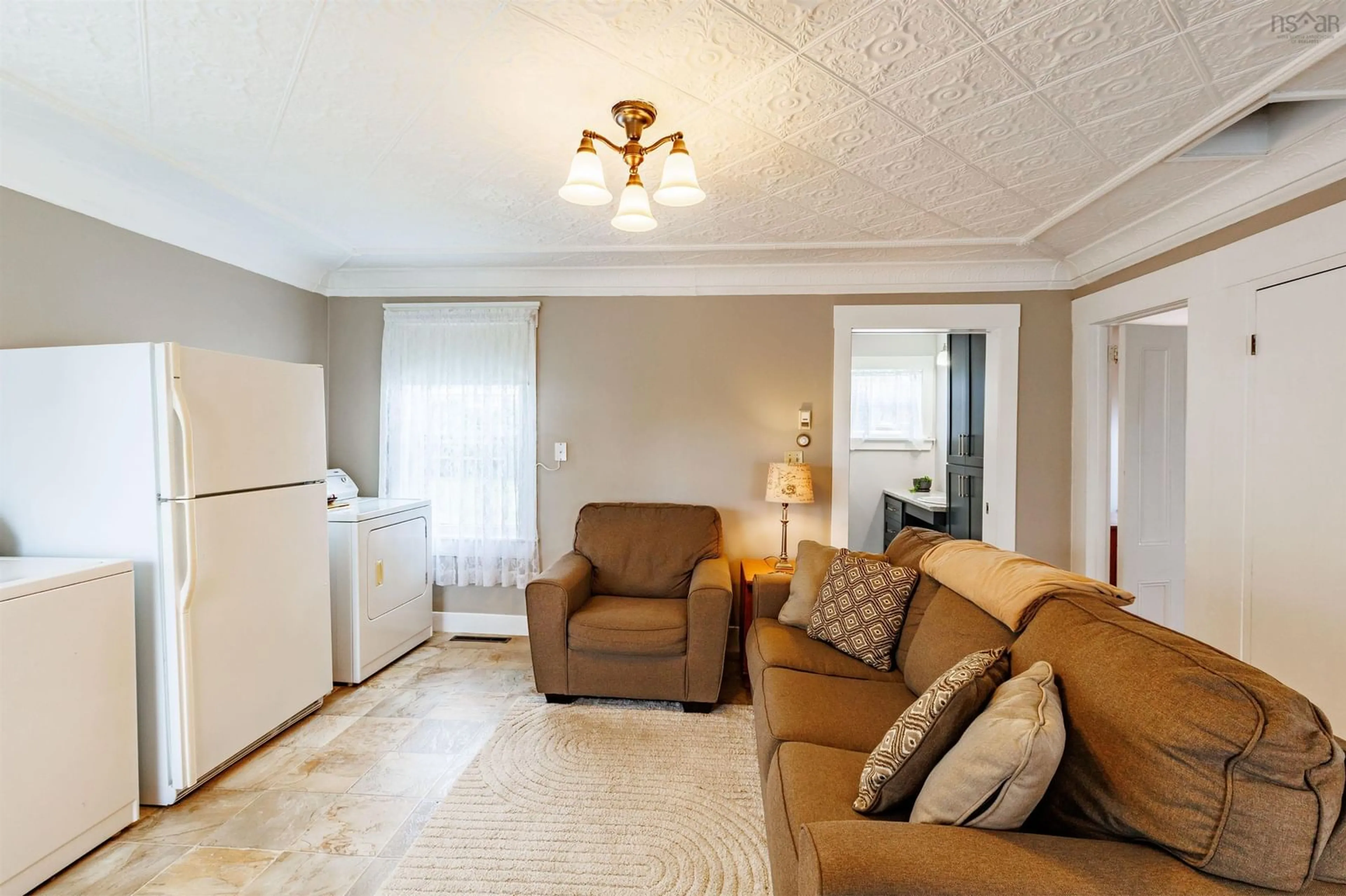 Living room with furniture, unknown for 684 Highway 335 Hwy, West Pubnico Nova Scotia B0W 3S0