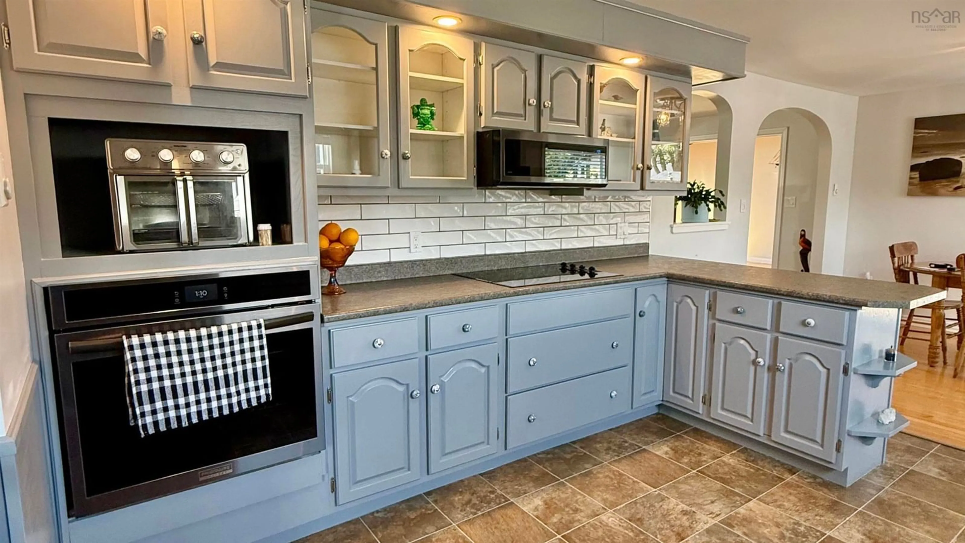 Open concept kitchen, ceramic/tile floor for 20 Parade St, Yarmouth Nova Scotia B5A 3A4