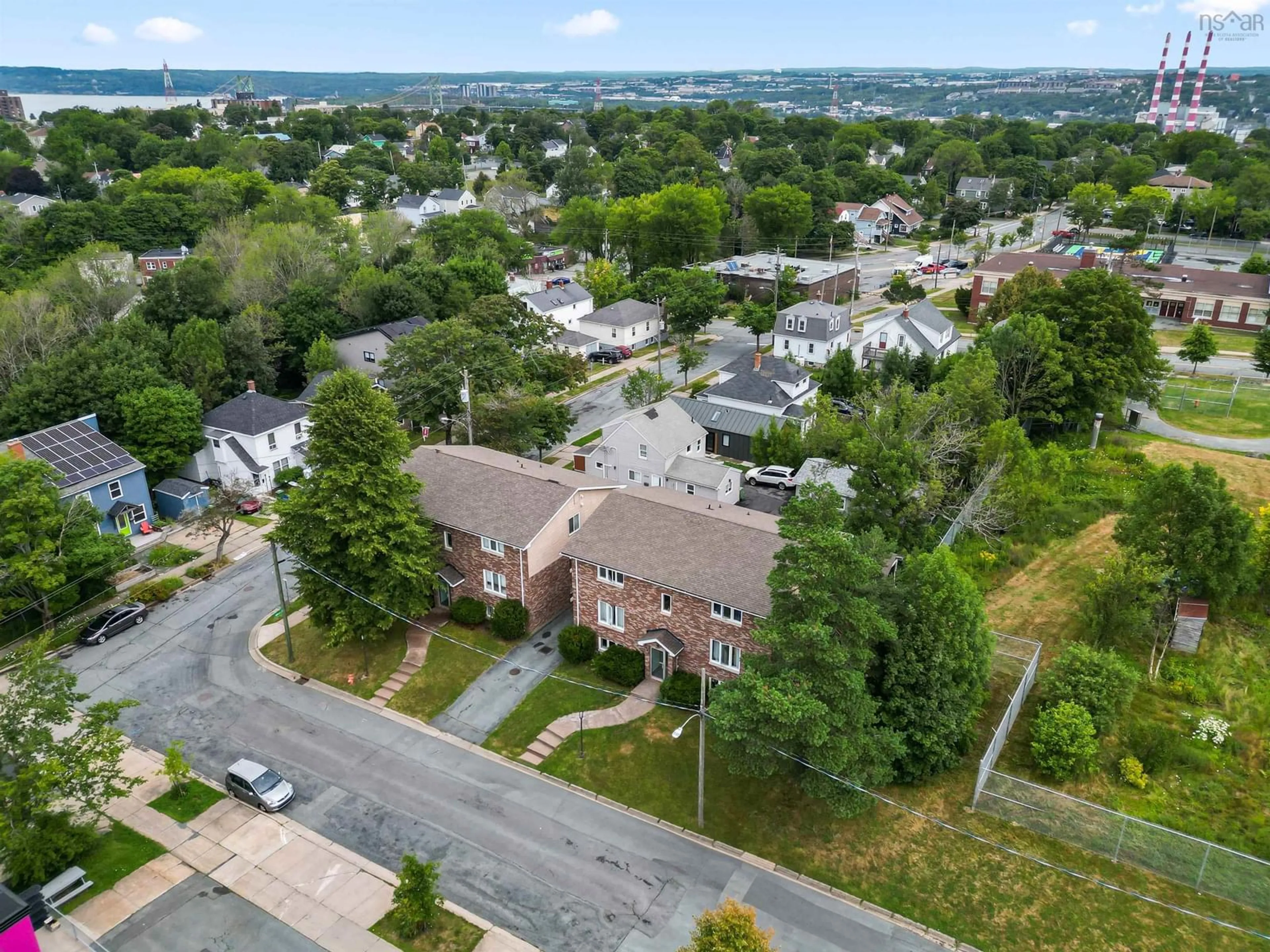 A pic from outside/outdoor area/front of a property/back of a property/a pic from drone, street for 3483 Prescott St #2, Halifax Peninsula Nova Scotia B3K 4Y4