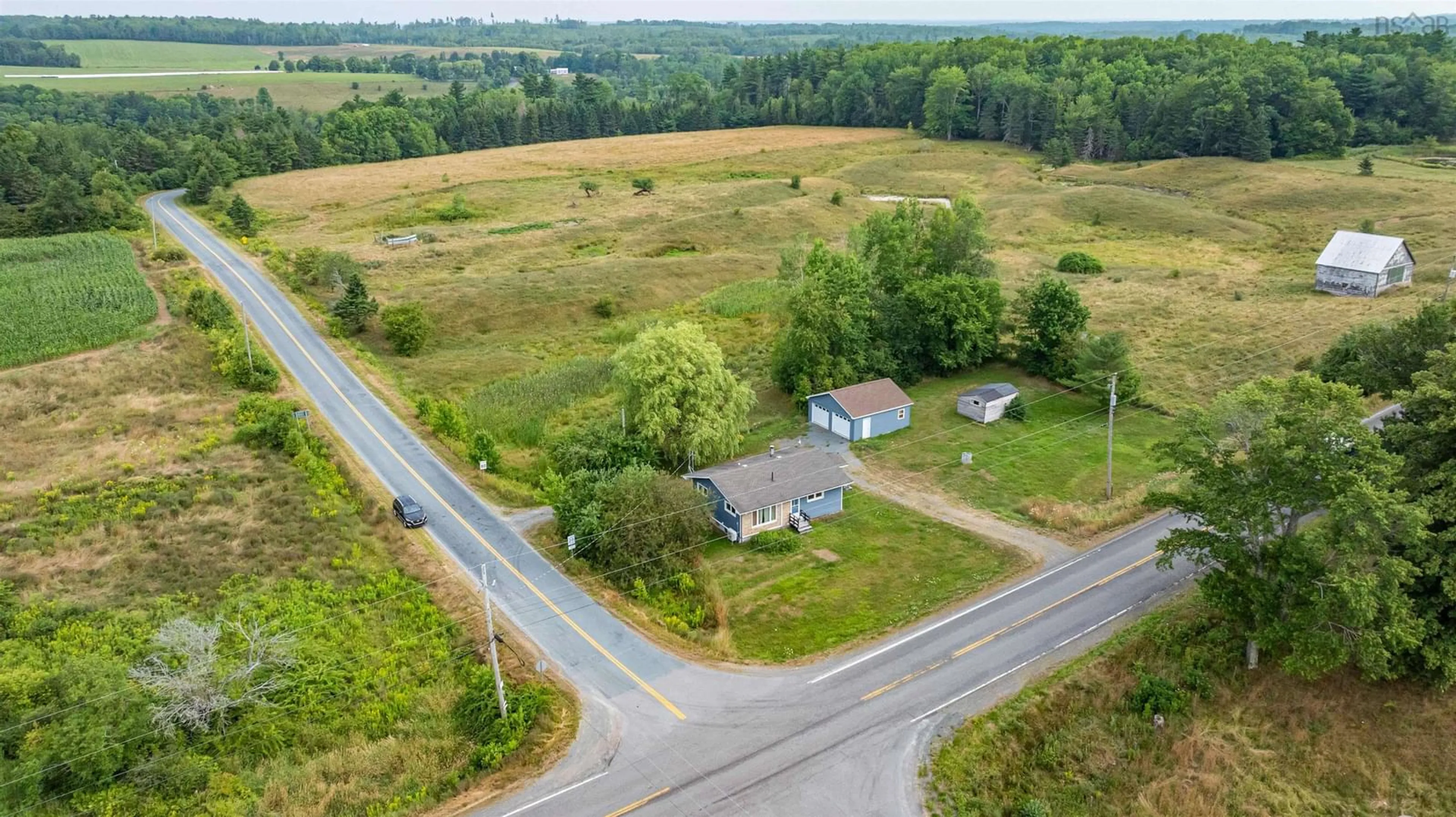 A pic from outside/outdoor area/front of a property/back of a property/a pic from drone, unknown for 9347 14 Hwy, Woodville Nova Scotia B0N 2A0