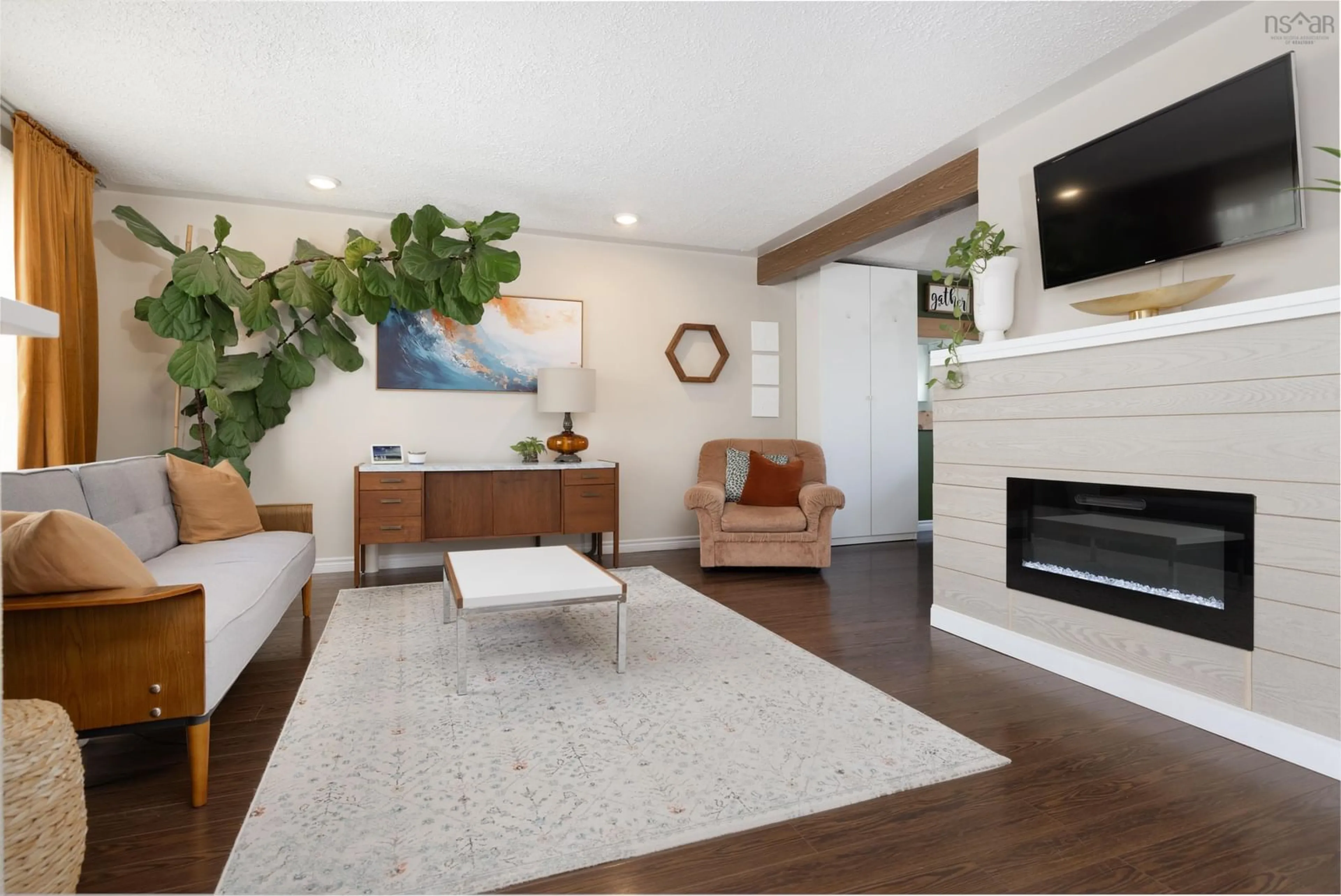 Living room with furniture, wood/laminate floor for 83 Stuart Harris Dr, Dartmouth Nova Scotia B2W 3Z8