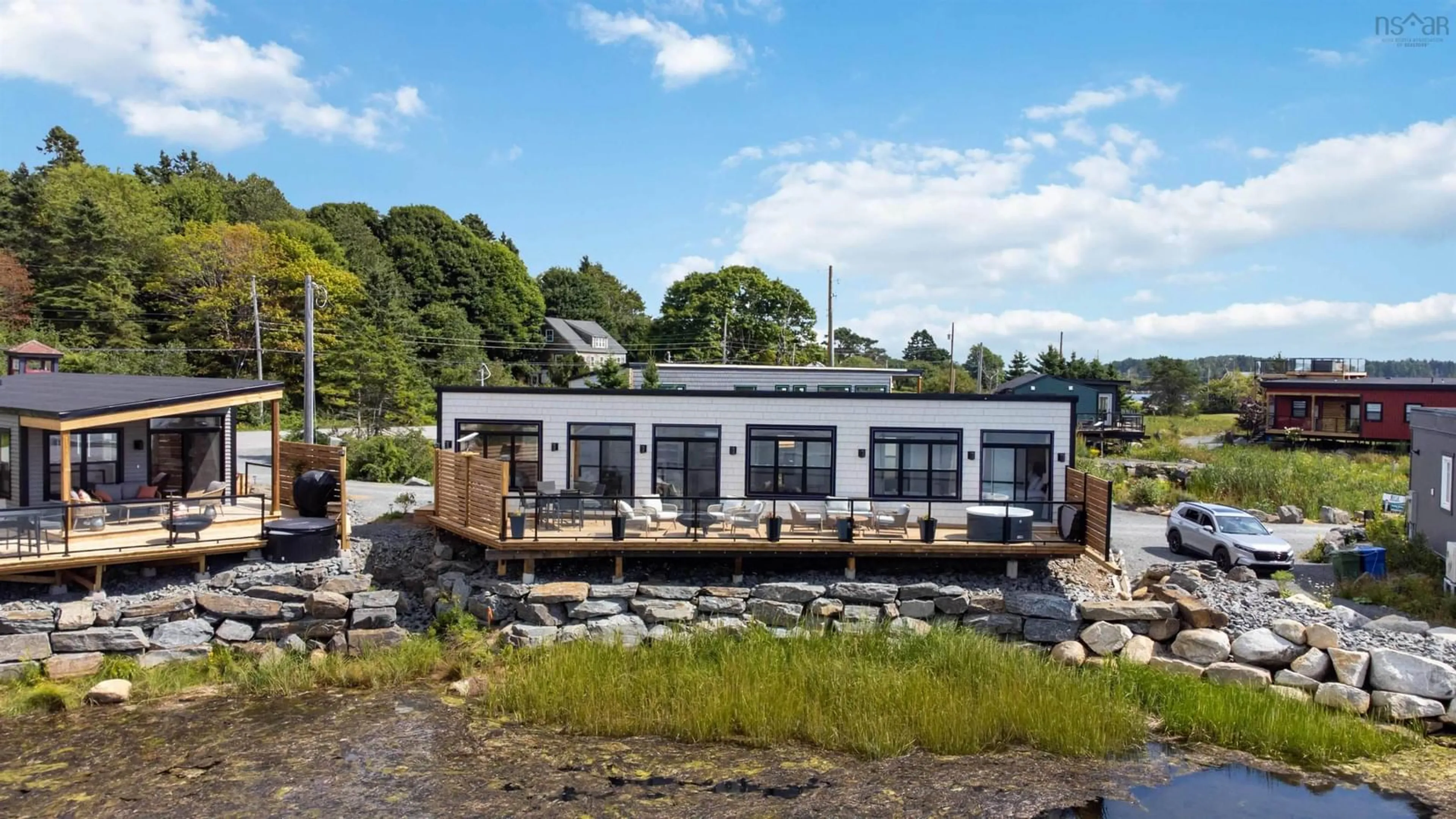 A pic from outside/outdoor area/front of a property/back of a property/a pic from drone, water/lake/river/ocean view for 693 Masons Beach Rd #12, First South Nova Scotia B0J 2C0