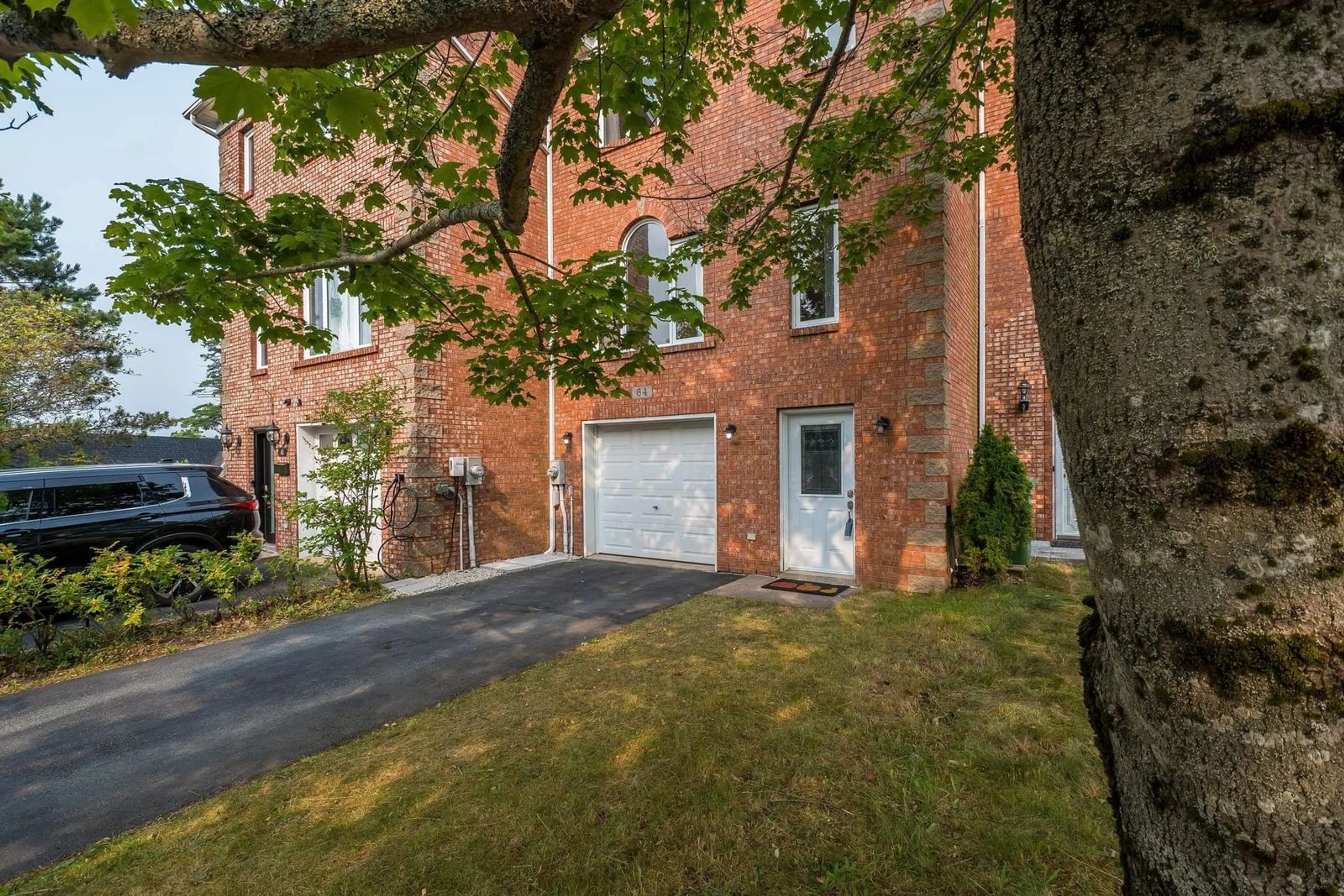 Home with brick exterior material, street for 64 Brookshire Crt, Bedford Nova Scotia B4A 4E2
