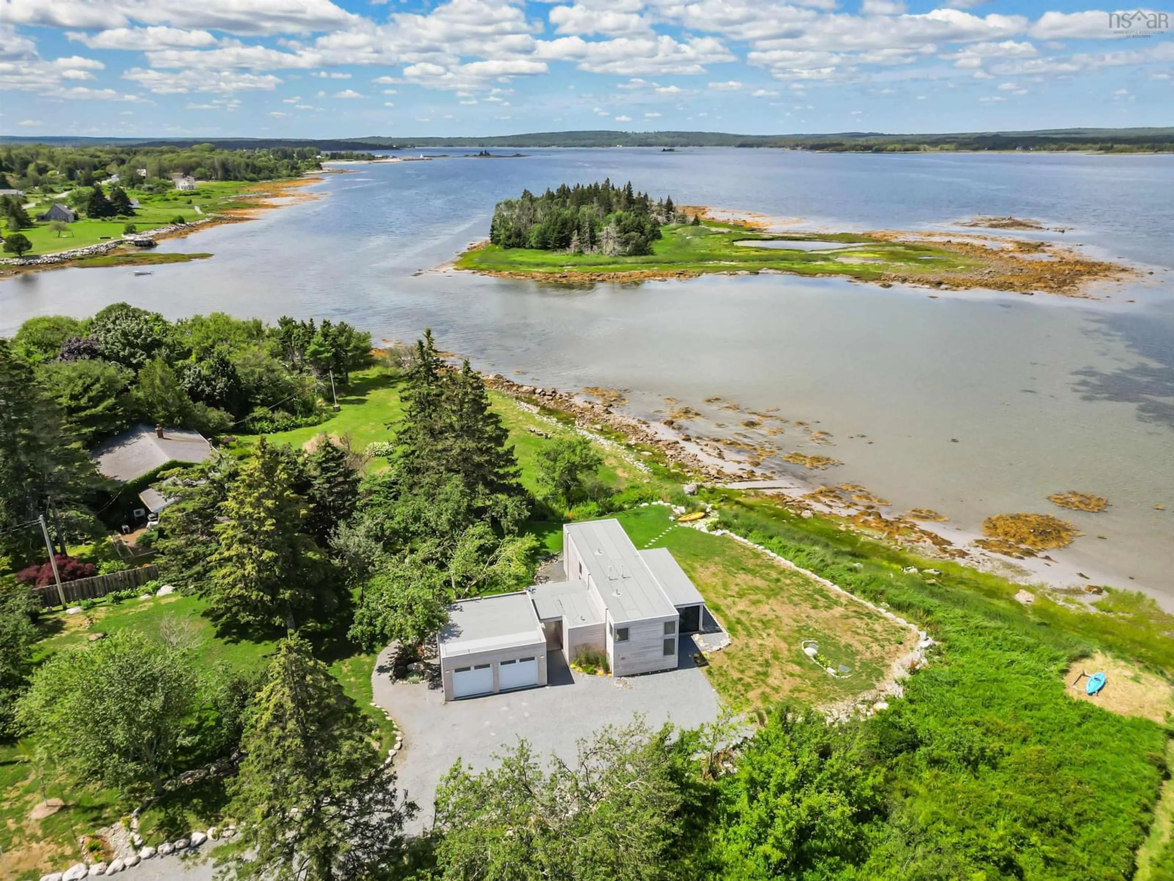 A pic from outside/outdoor area/front of a property/back of a property/a pic from drone, water/lake/river/ocean view for 325 Long Cove Rd, Port Medway Nova Scotia B0S 2T0