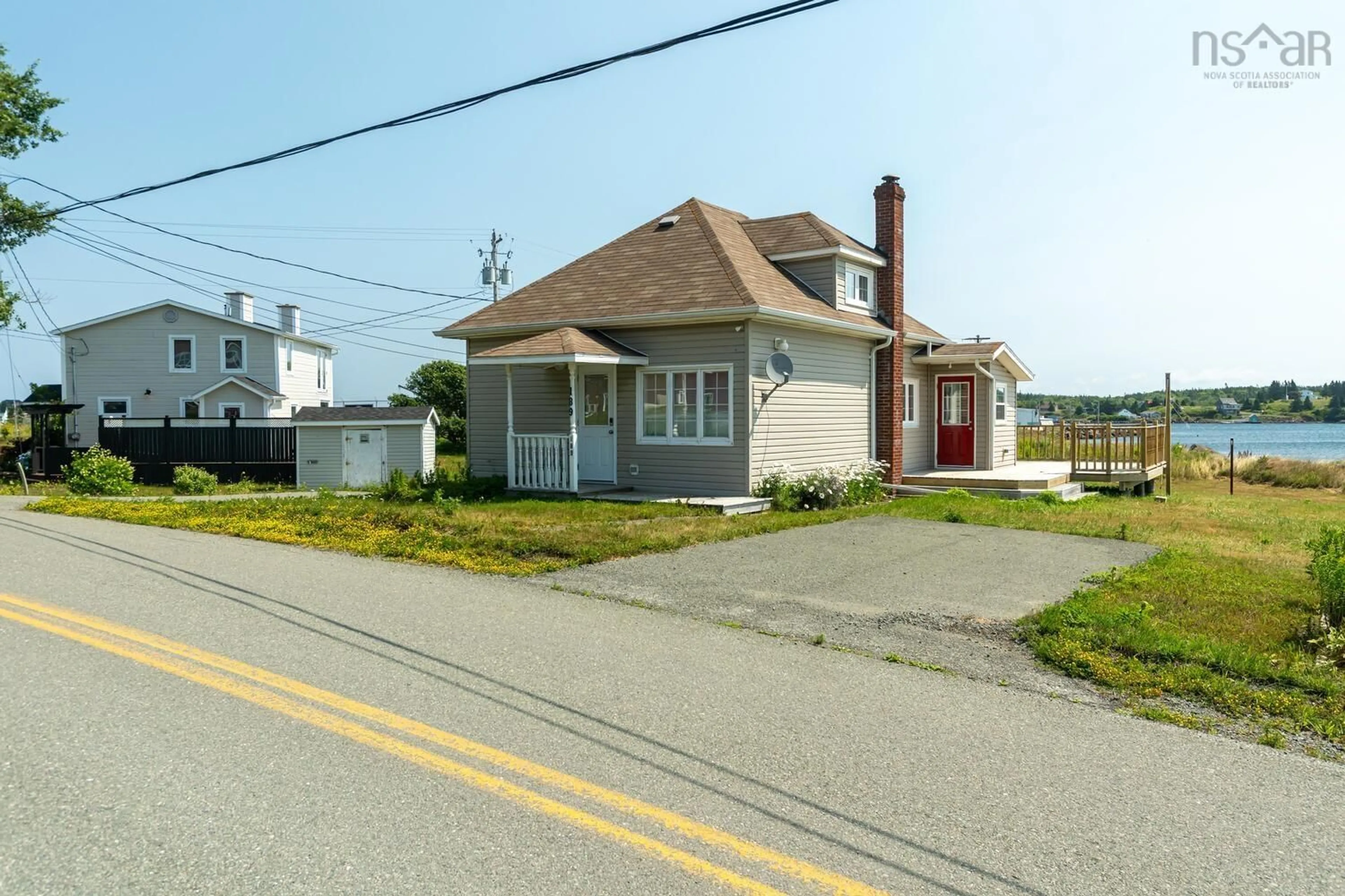 A pic from outside/outdoor area/front of a property/back of a property/a pic from drone, street for 189 Boudreauville Rd, Petit-De-Grat Nova Scotia B0E 2L0