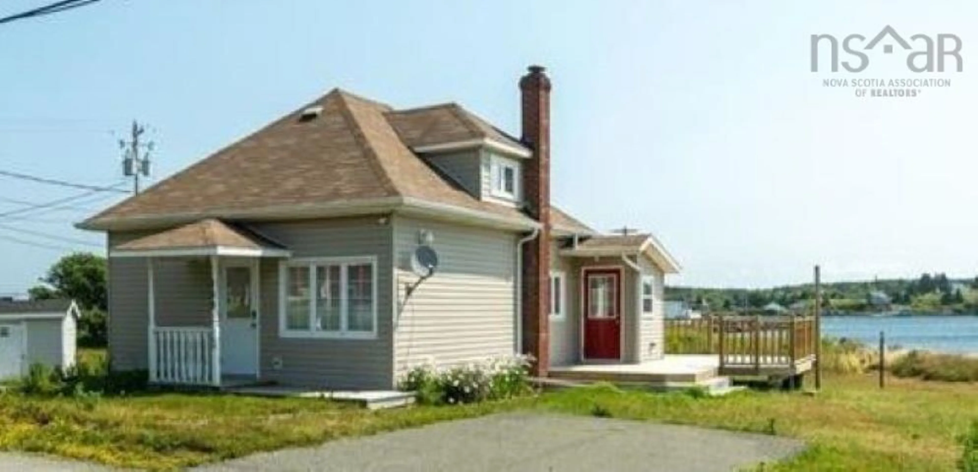 Home with vinyl exterior material, street for 189 Boudreauville Rd, Petit-De-Grat Nova Scotia B0E 2L0
