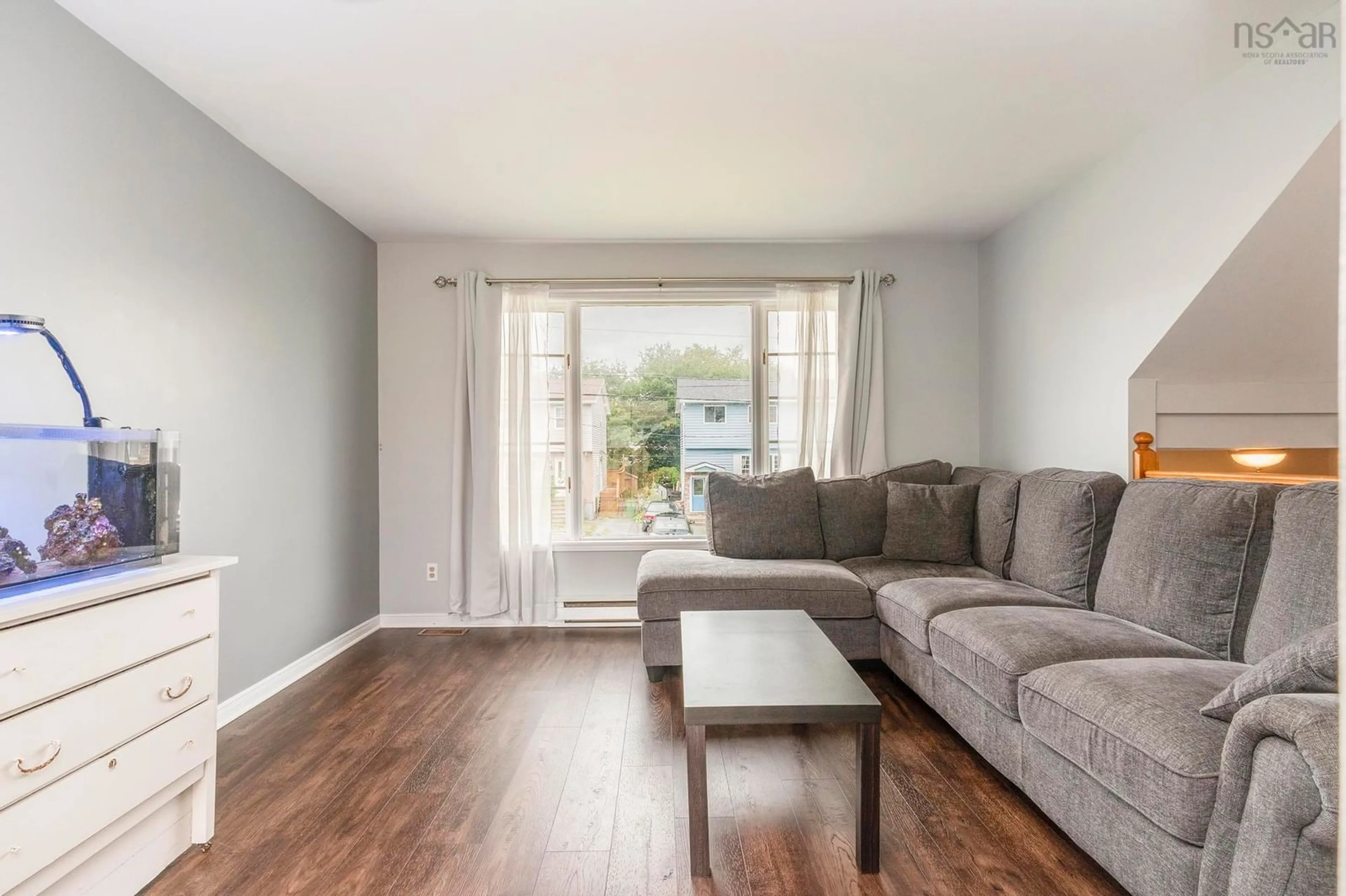 Living room with furniture, wood/laminate floor for 45 Ancona Pl, Dartmouth Nova Scotia B2X 3K7