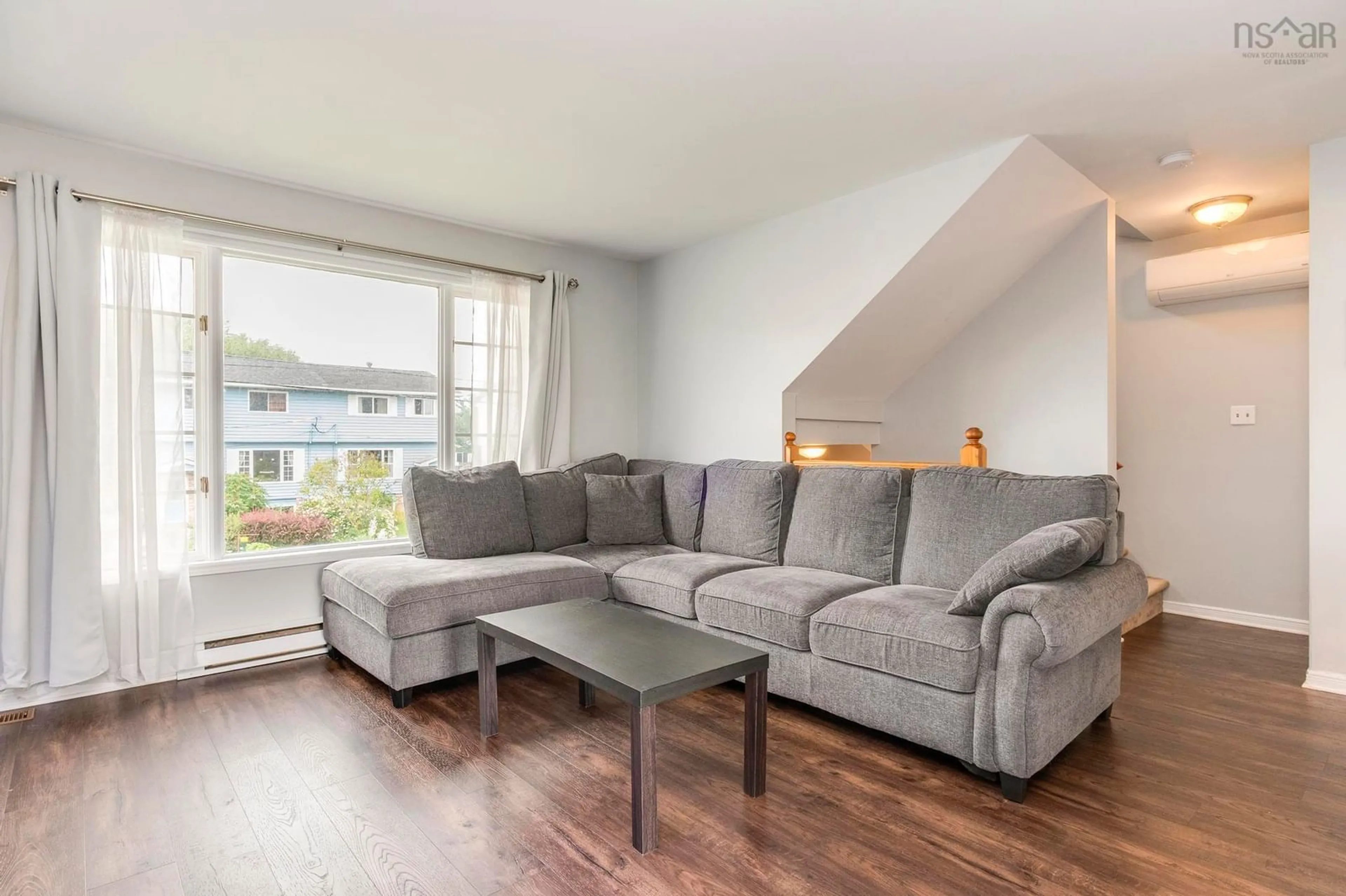 Living room with furniture, wood/laminate floor for 45 Ancona Pl, Dartmouth Nova Scotia B2X 3K7