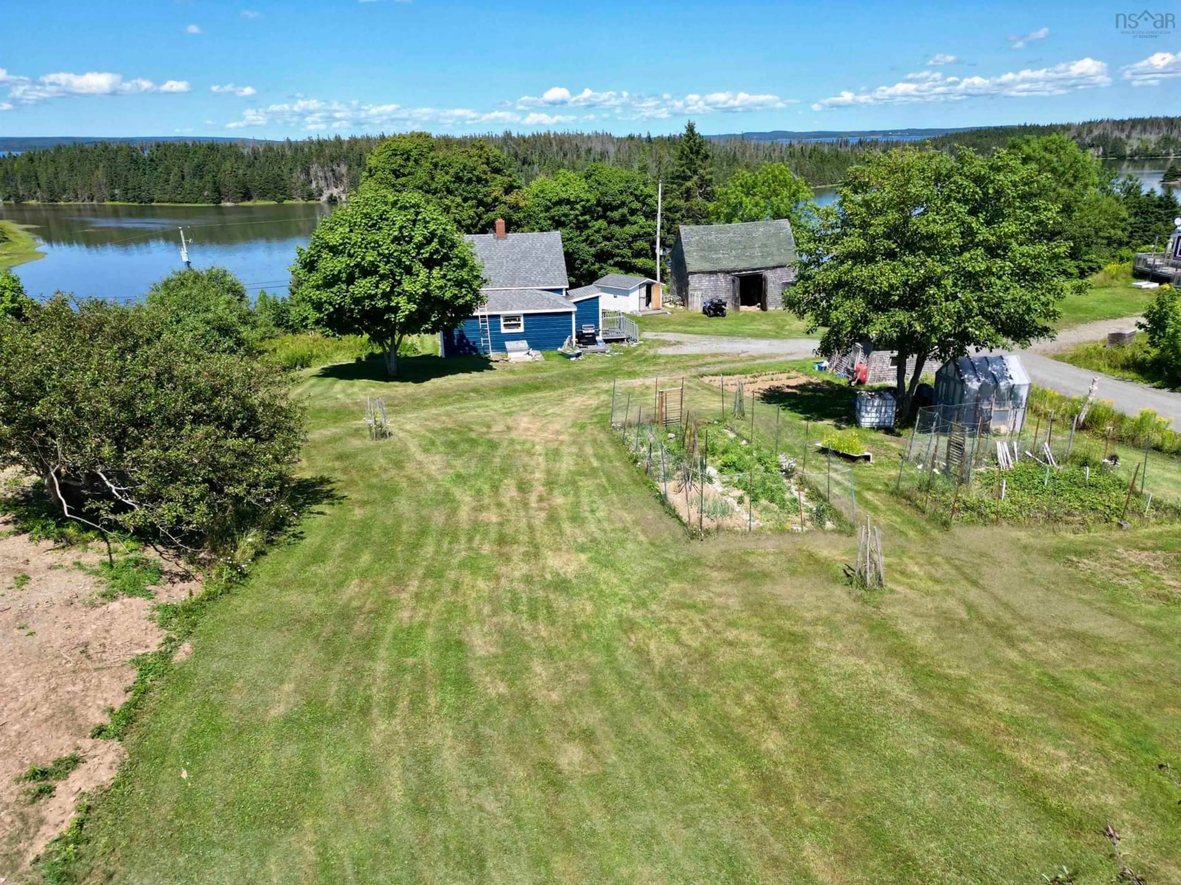 A pic from outside/outdoor area/front of a property/back of a property/a pic from drone, water/lake/river/ocean view for 10 Pettipas Rd, Poirierville Nova Scotia B0E 1K0