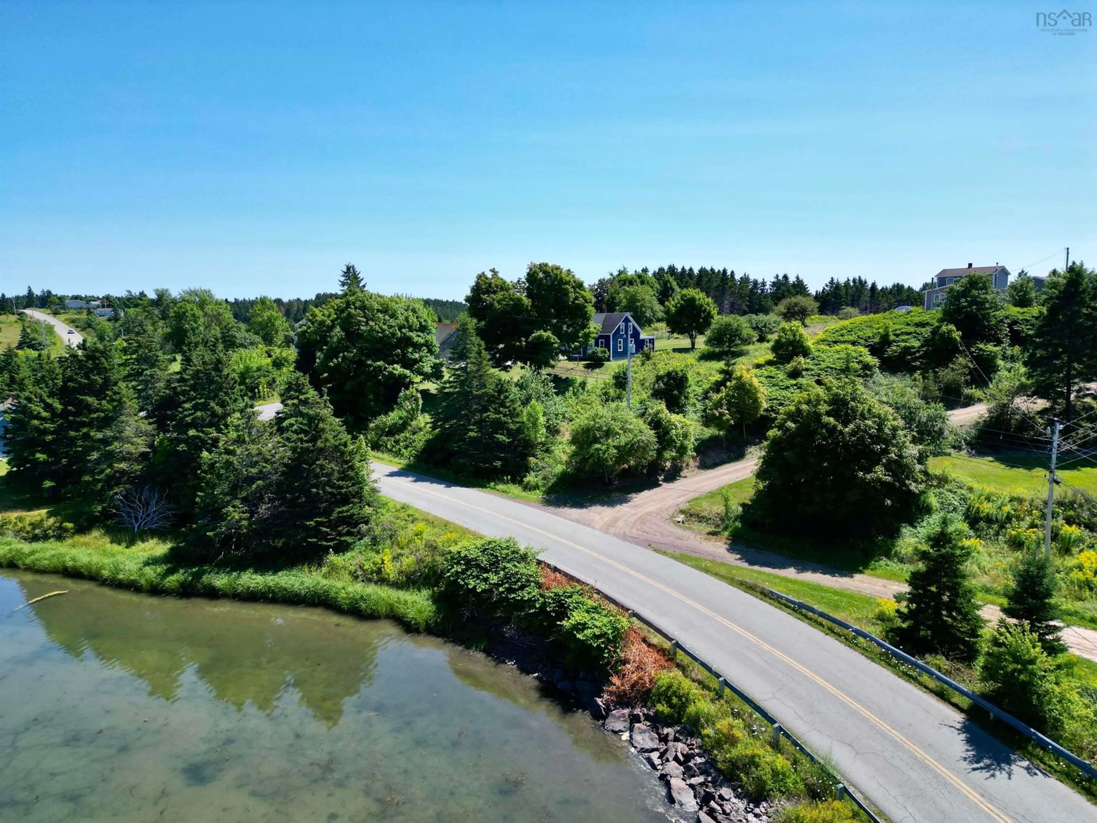 A pic from outside/outdoor area/front of a property/back of a property/a pic from drone, water/lake/river/ocean view for 10 Pettipas Rd, Poirierville Nova Scotia B0E 1K0