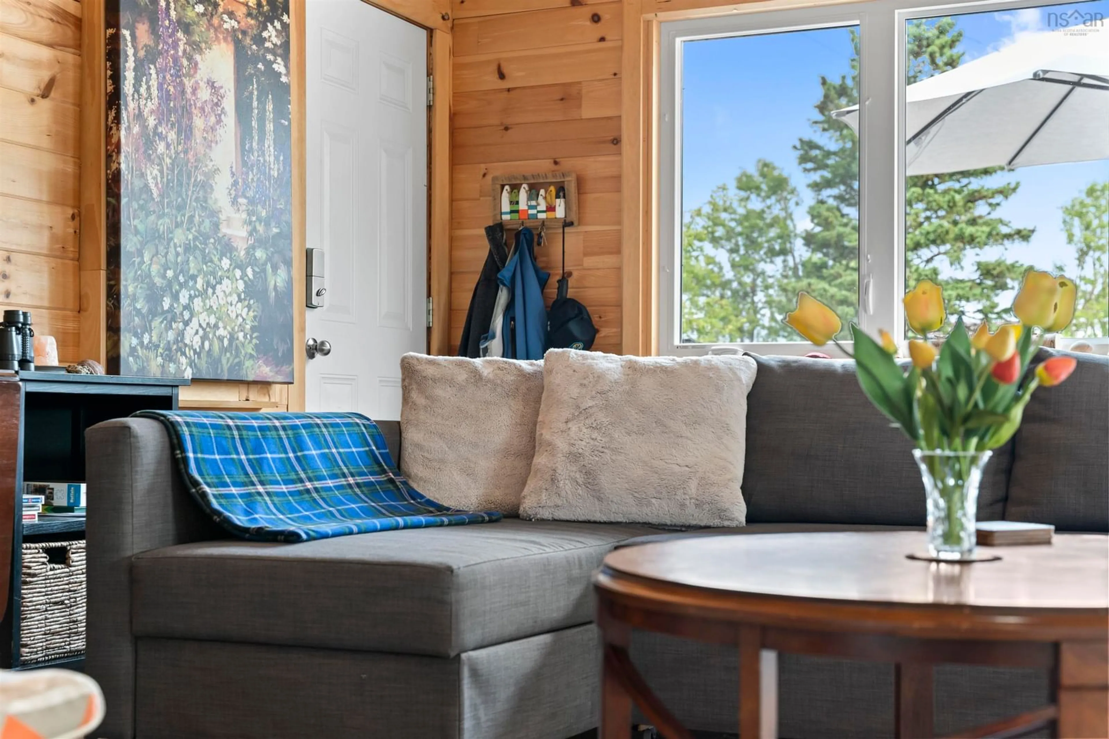 Living room with furniture, wood/laminate floor for 13 Seaview Dr, Brule Shore Nova Scotia B0K 1V0
