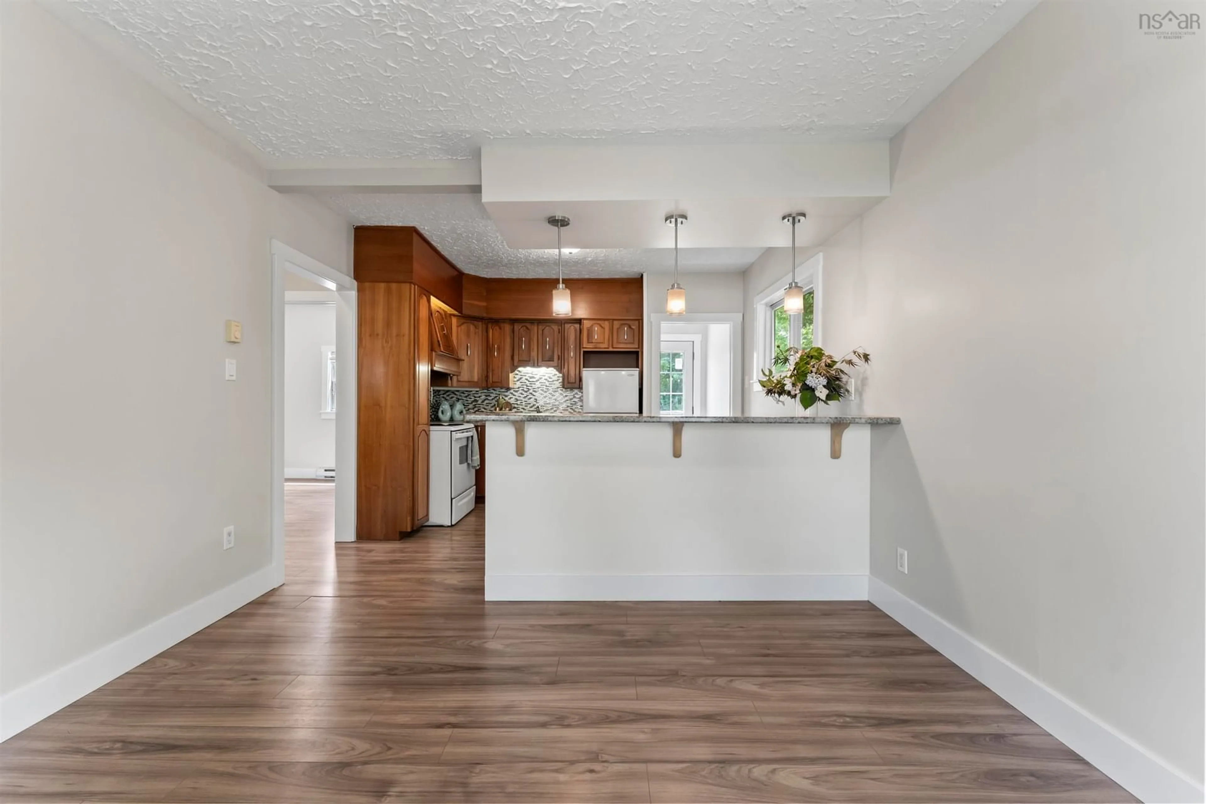 Open concept kitchen, wood/laminate floor for 48 Adelaide Ave, Fairview Nova Scotia B3N 2N6