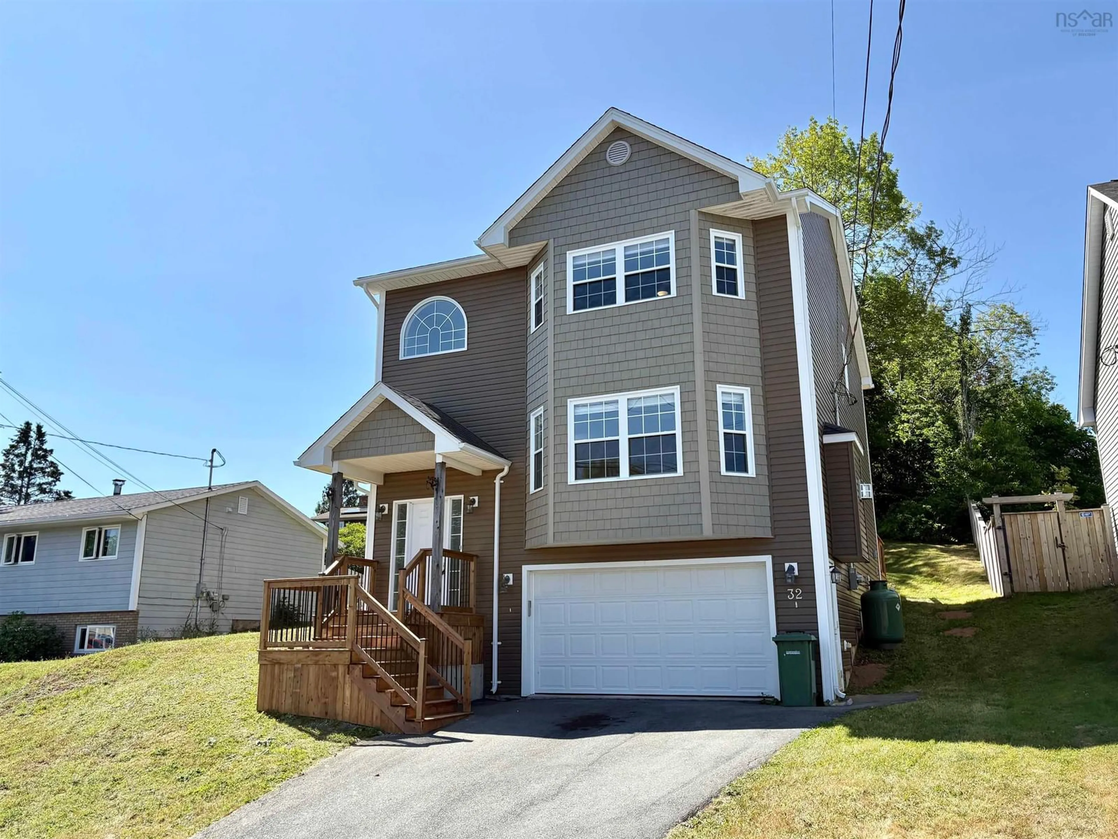 Home with vinyl exterior material, street for 32 Baker Dr, Middle Sackville Nova Scotia B4E 1V1
