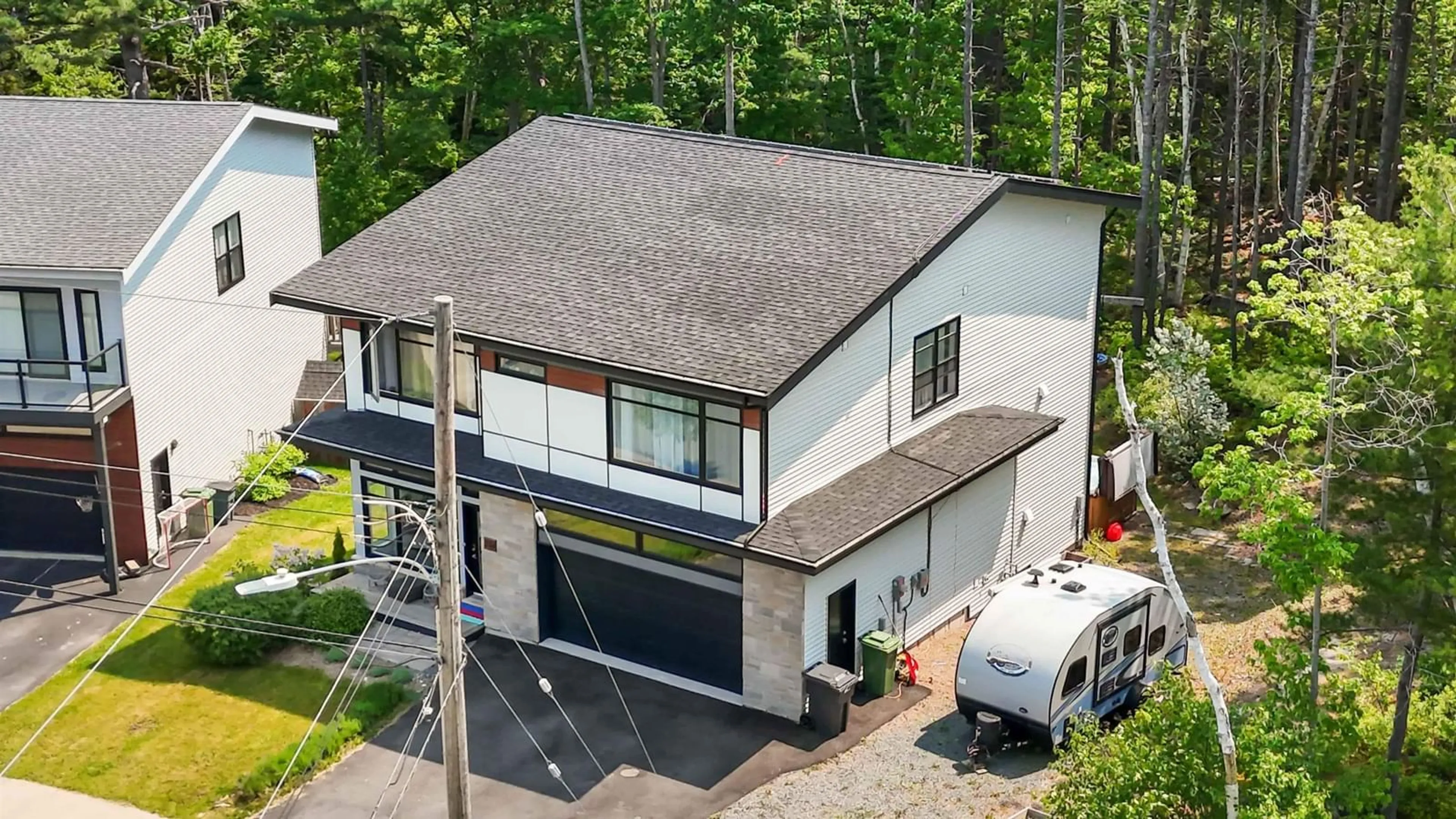A pic from outside/outdoor area/front of a property/back of a property/a pic from drone, unknown for 216 Amesbury Gate, Bedford Nova Scotia B4B 0S7