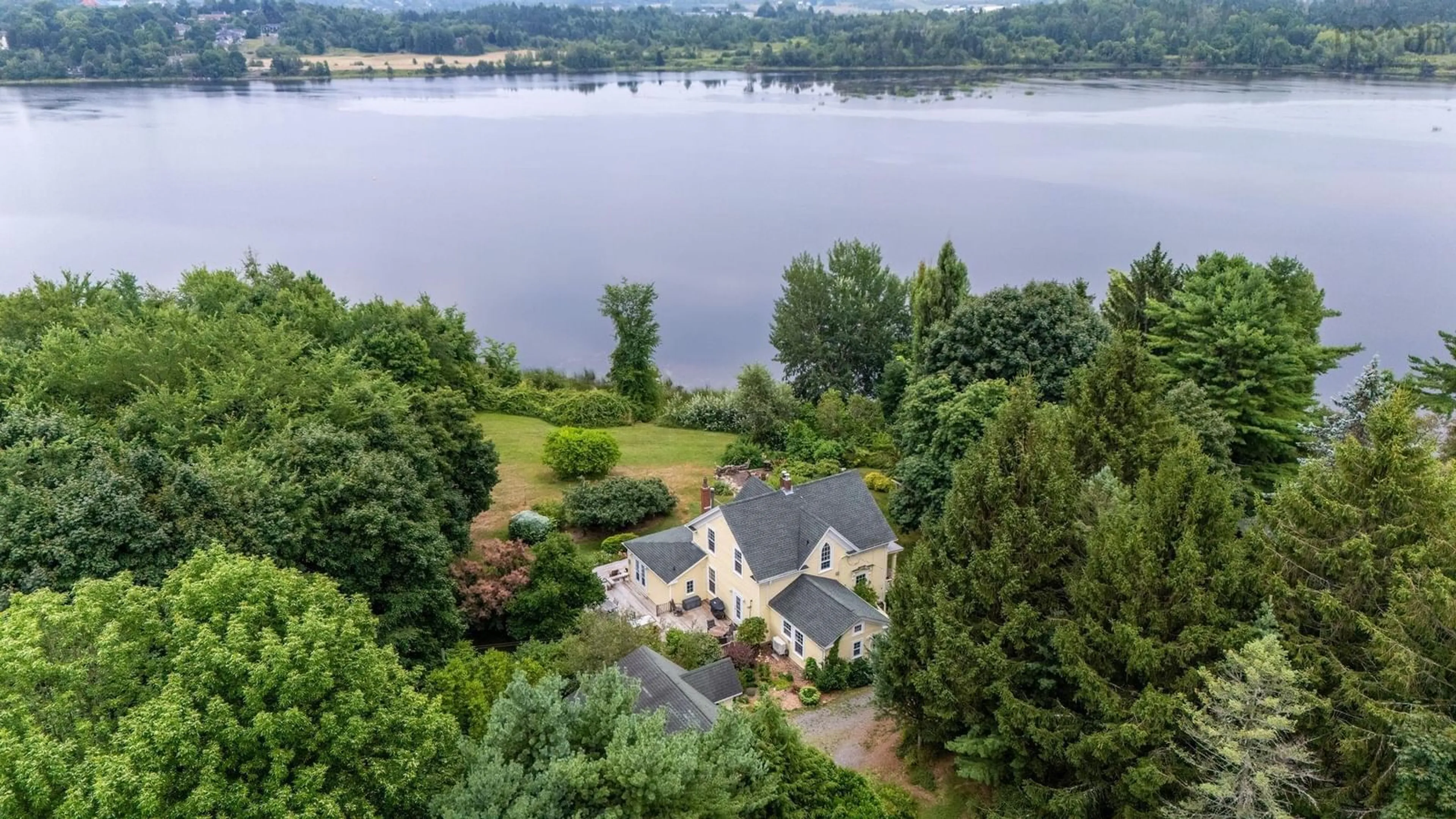 A pic from outside/outdoor area/front of a property/back of a property/a pic from drone, water/lake/river/ocean view for 129 Town Rd, Falmouth Nova Scotia B0P 1P0