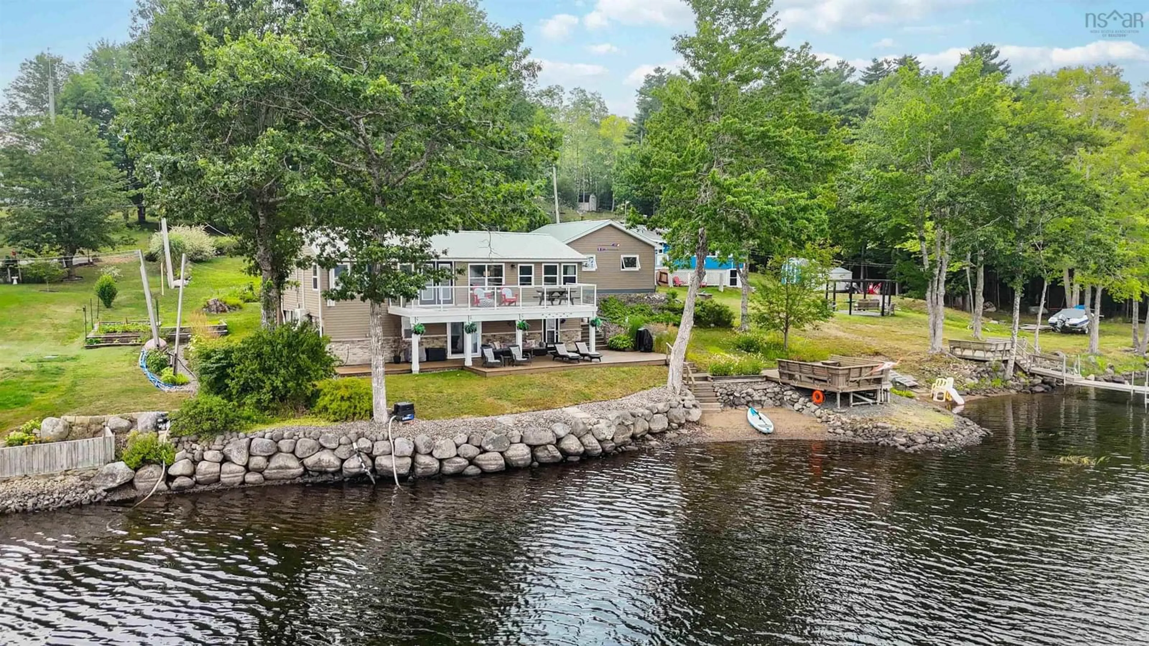 A pic from outside/outdoor area/front of a property/back of a property/a pic from drone, water/lake/river/ocean view for 87 Lake Road Number 5, Pine Grove Nova Scotia B0J 1E0