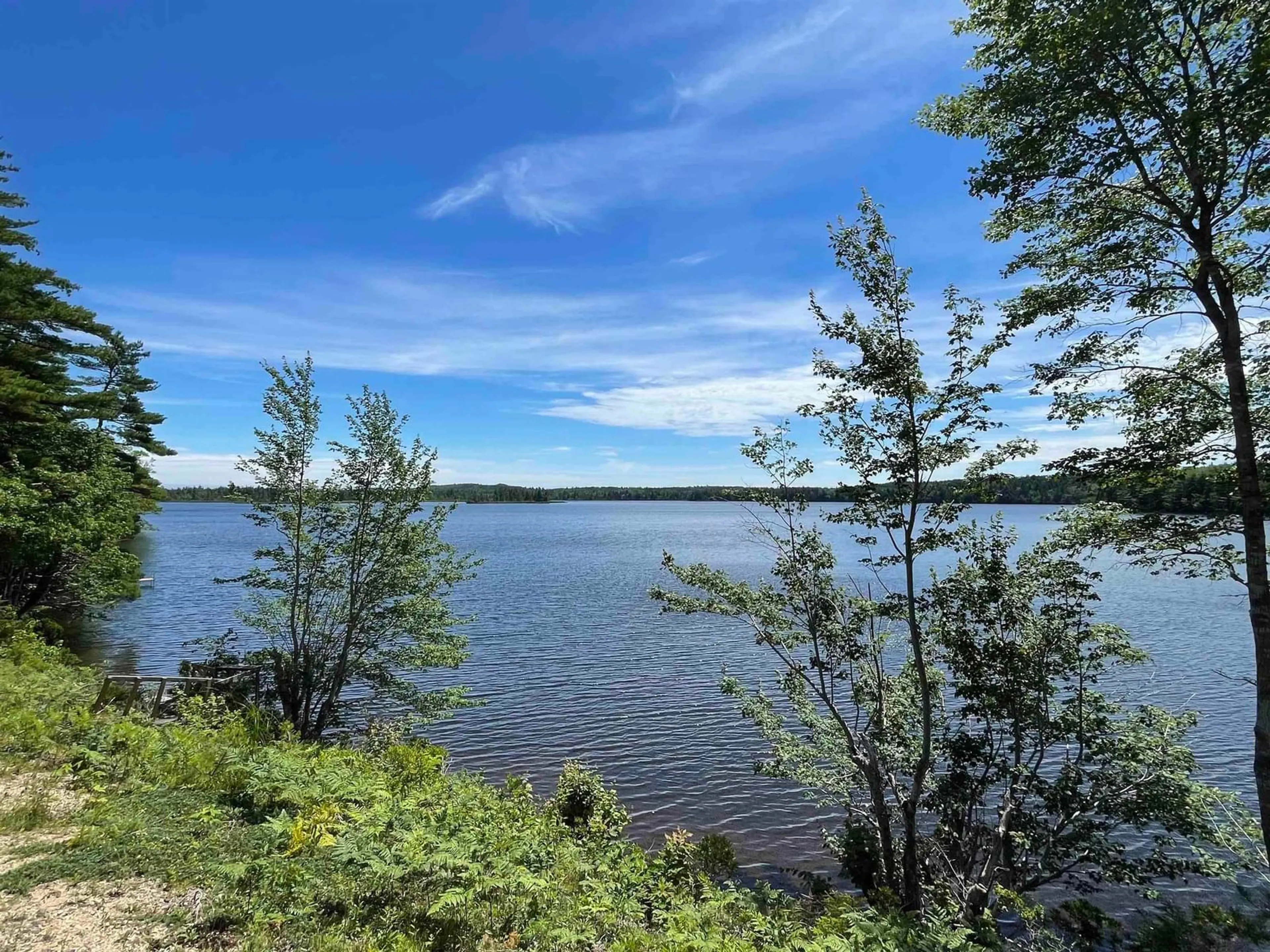 A pic from outside/outdoor area/front of a property/back of a property/a pic from drone, water/lake/river/ocean view for 100 Pernette Lake Rd, Lake Centre Nova Scotia B0R 1G0