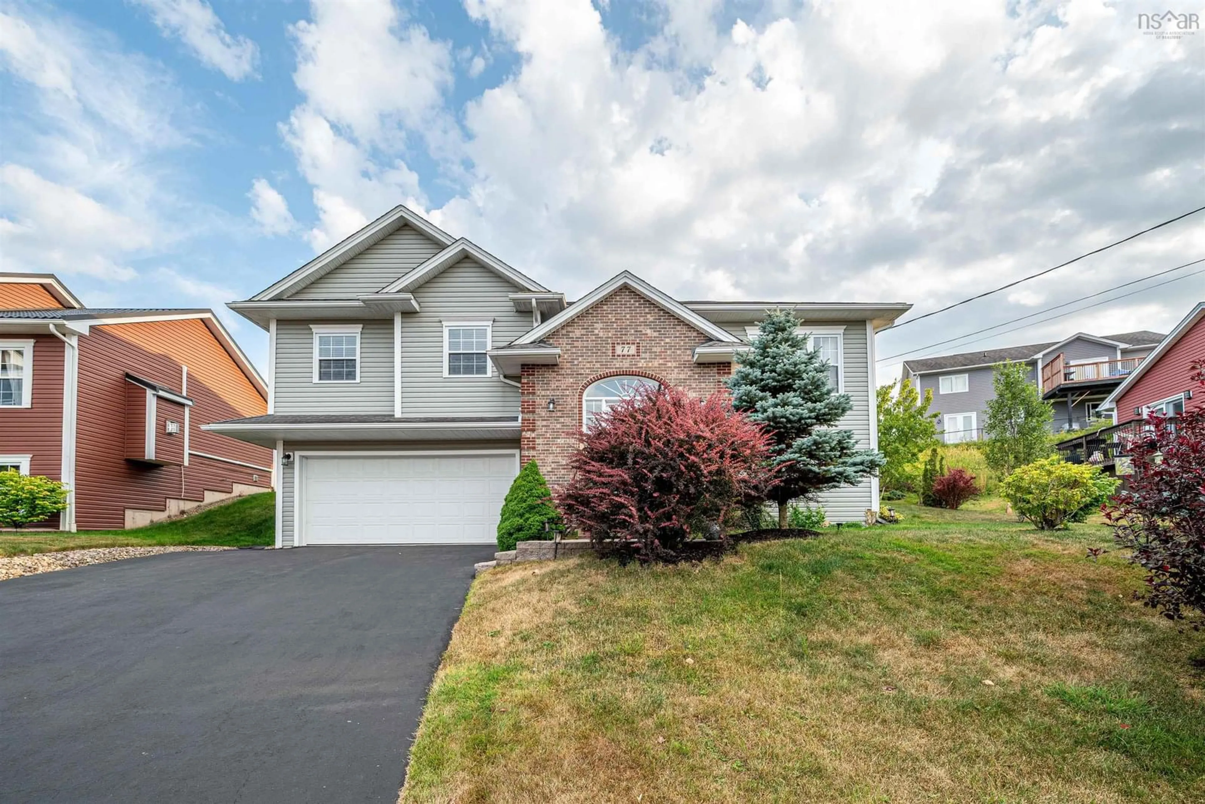 Home with vinyl exterior material, street for 77 Windwood Dr, Middle Sackville Nova Scotia B4E 3A2