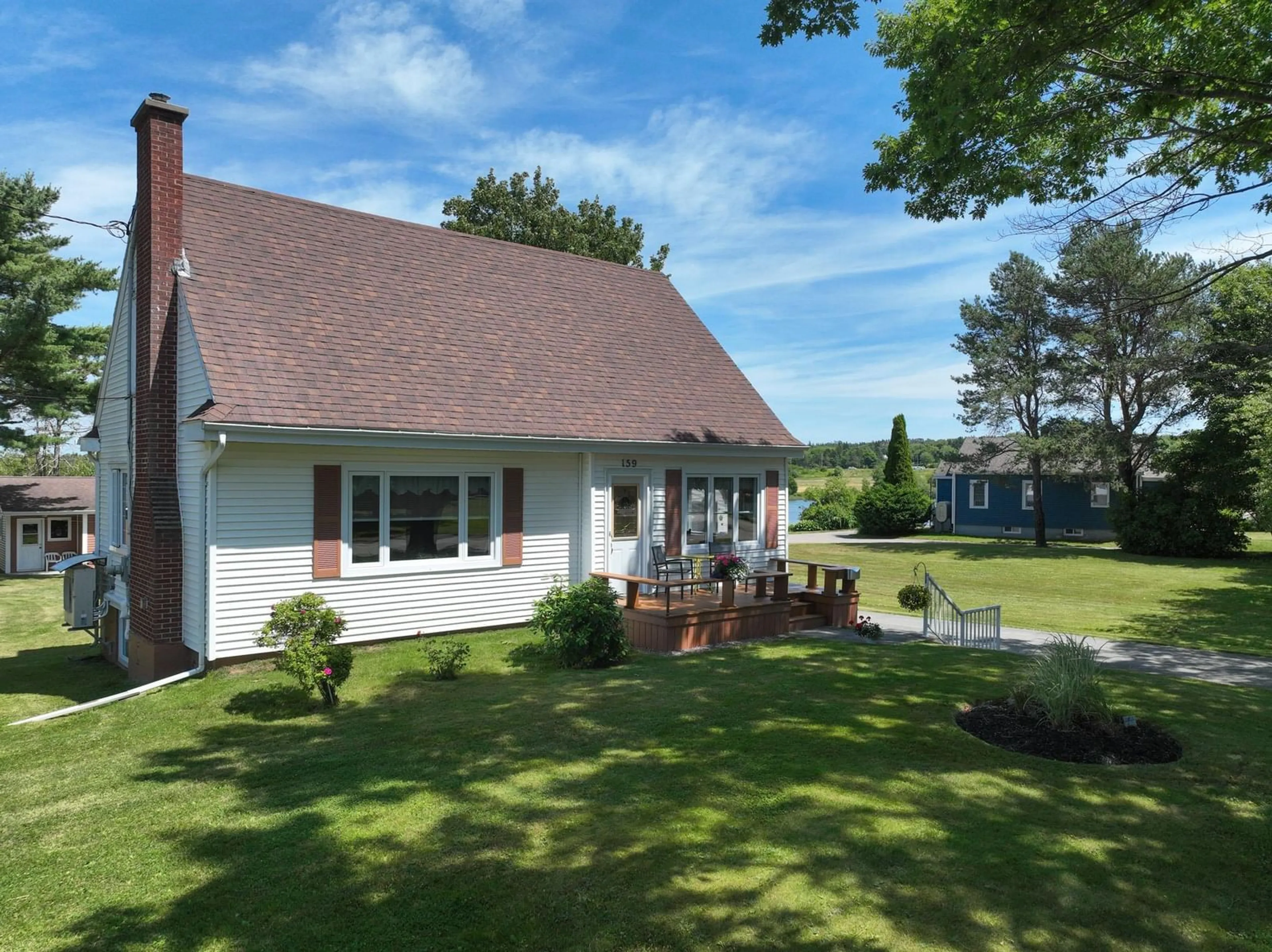 A pic from outside/outdoor area/front of a property/back of a property/a pic from drone, street for 159 Riverside Dr, Sydney River Nova Scotia B1S 1G6
