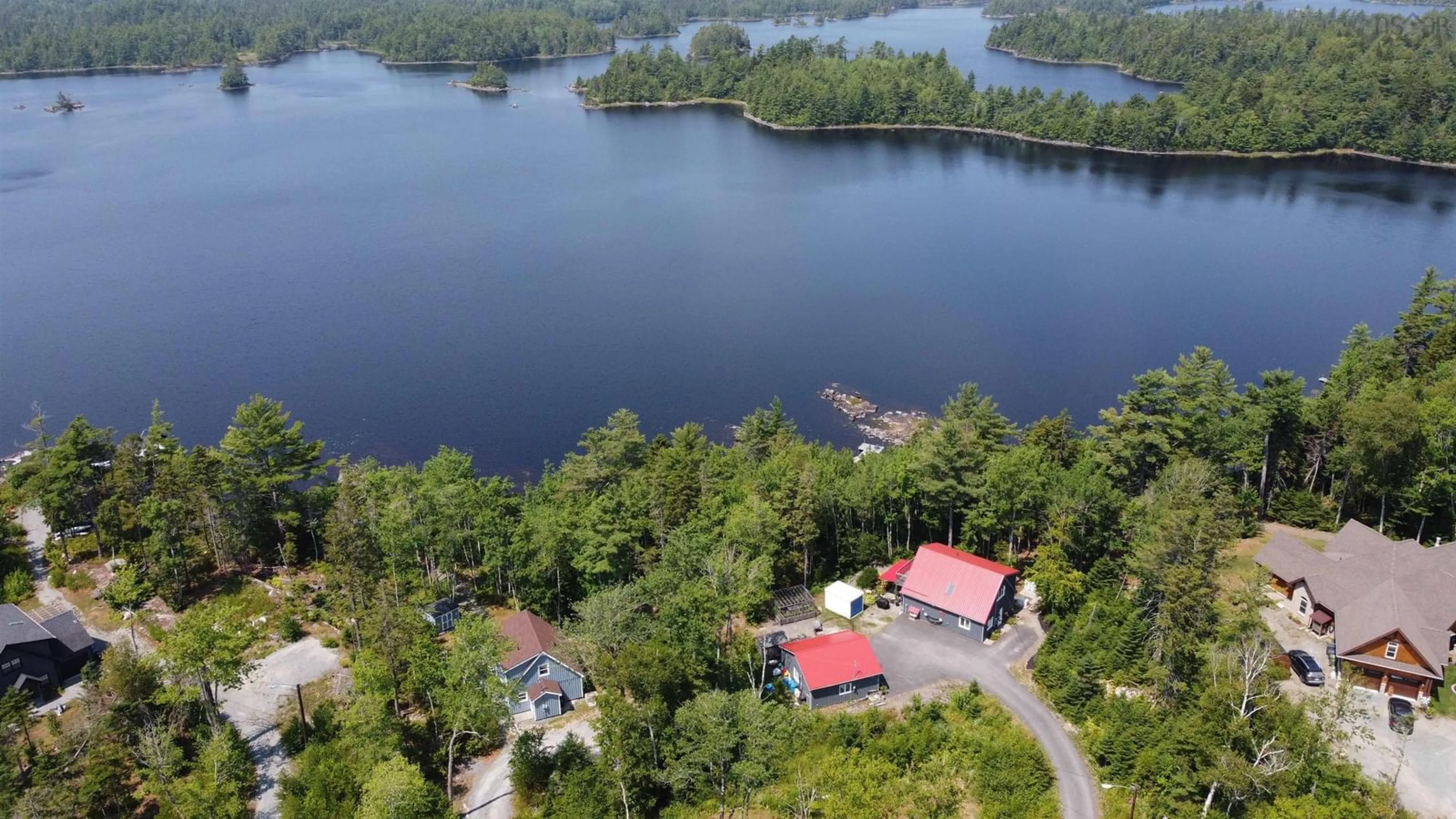 A pic from outside/outdoor area/front of a property/back of a property/a pic from drone, water/lake/river/ocean view for 62 Western Point Lane #4, East Uniacke Nova Scotia B0N 1Z0