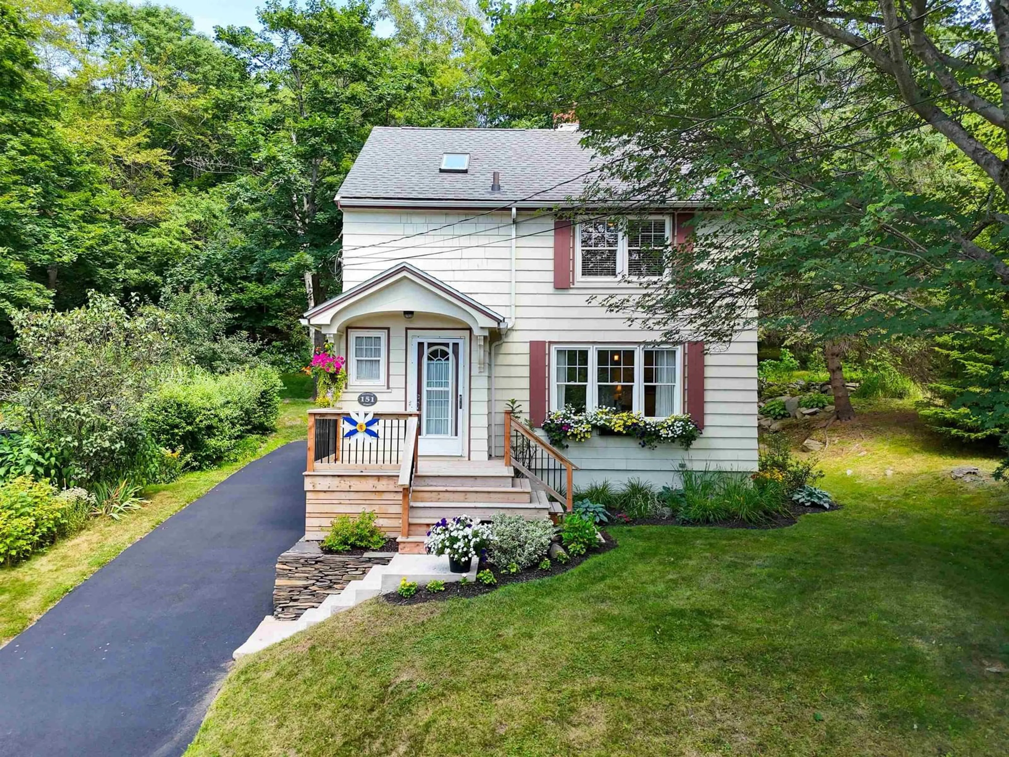 A pic from outside/outdoor area/front of a property/back of a property/a pic from drone, street for 151 Pleasant St, Dartmouth Nova Scotia B2Y 3P8