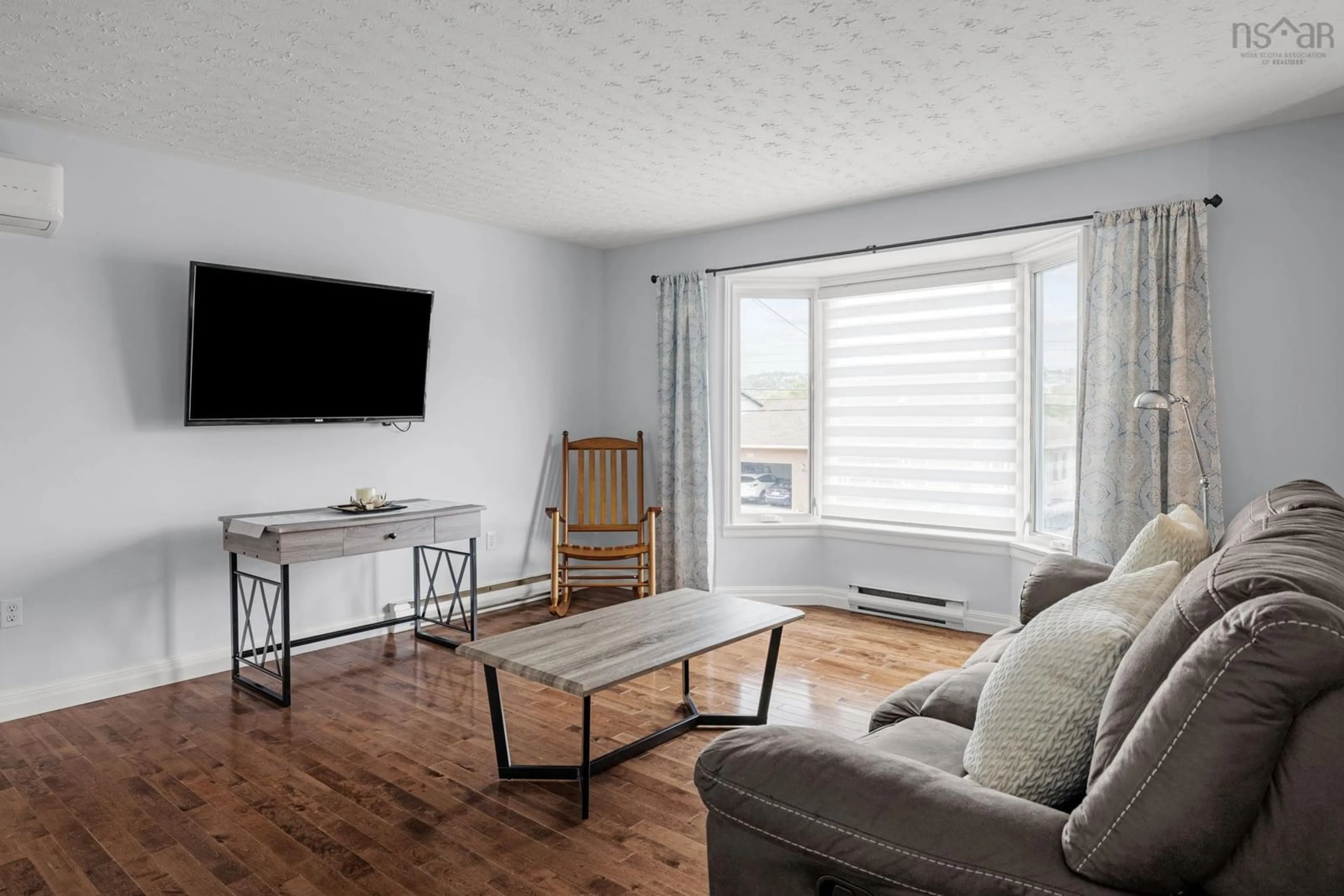 Living room with furniture, wood/laminate floor for 55 Diana Grace Ave, Dartmouth Nova Scotia B2W 6A2