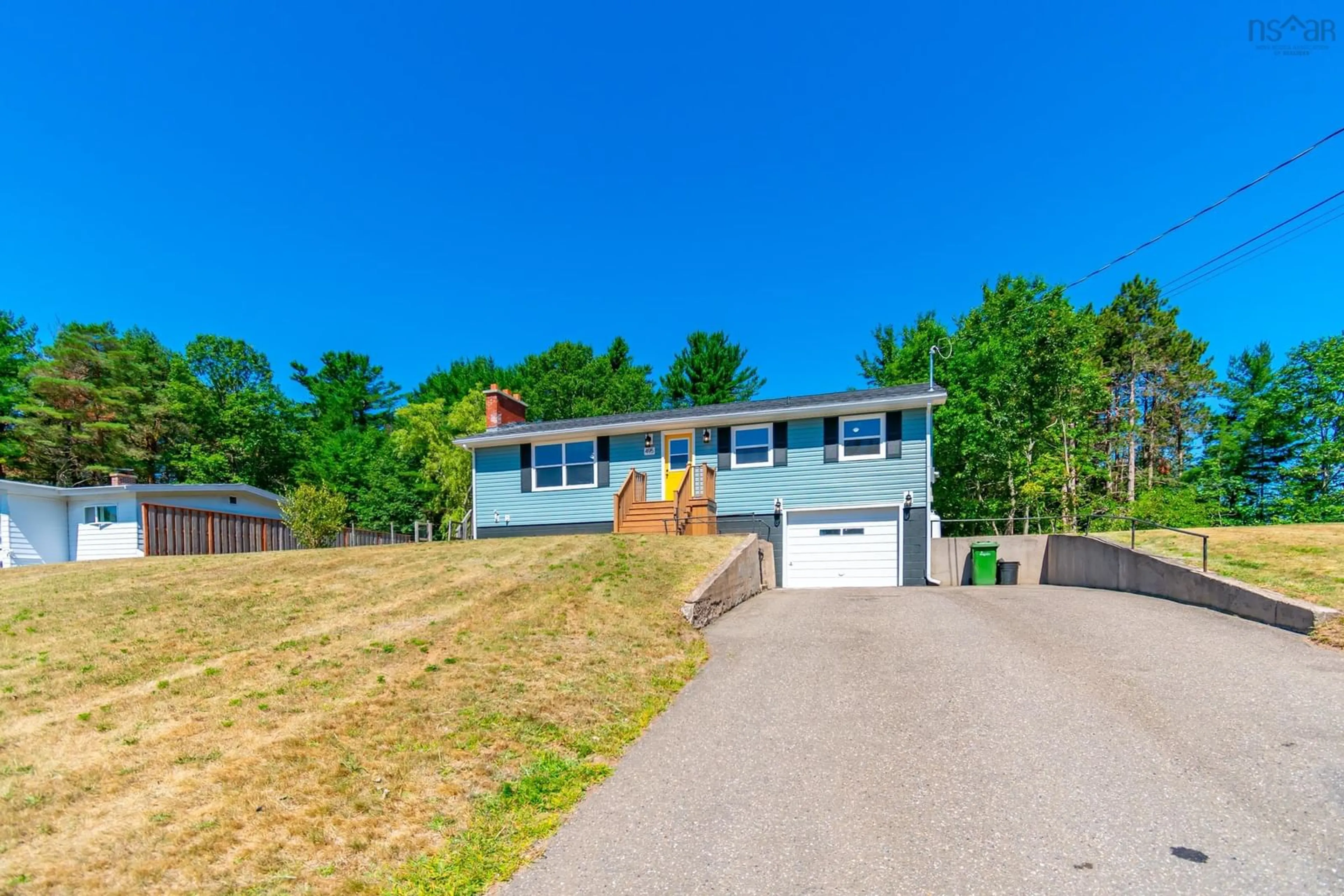 Home with vinyl exterior material, street for 495 Pine Ridge Ave, Kingston Nova Scotia B0P 1R0