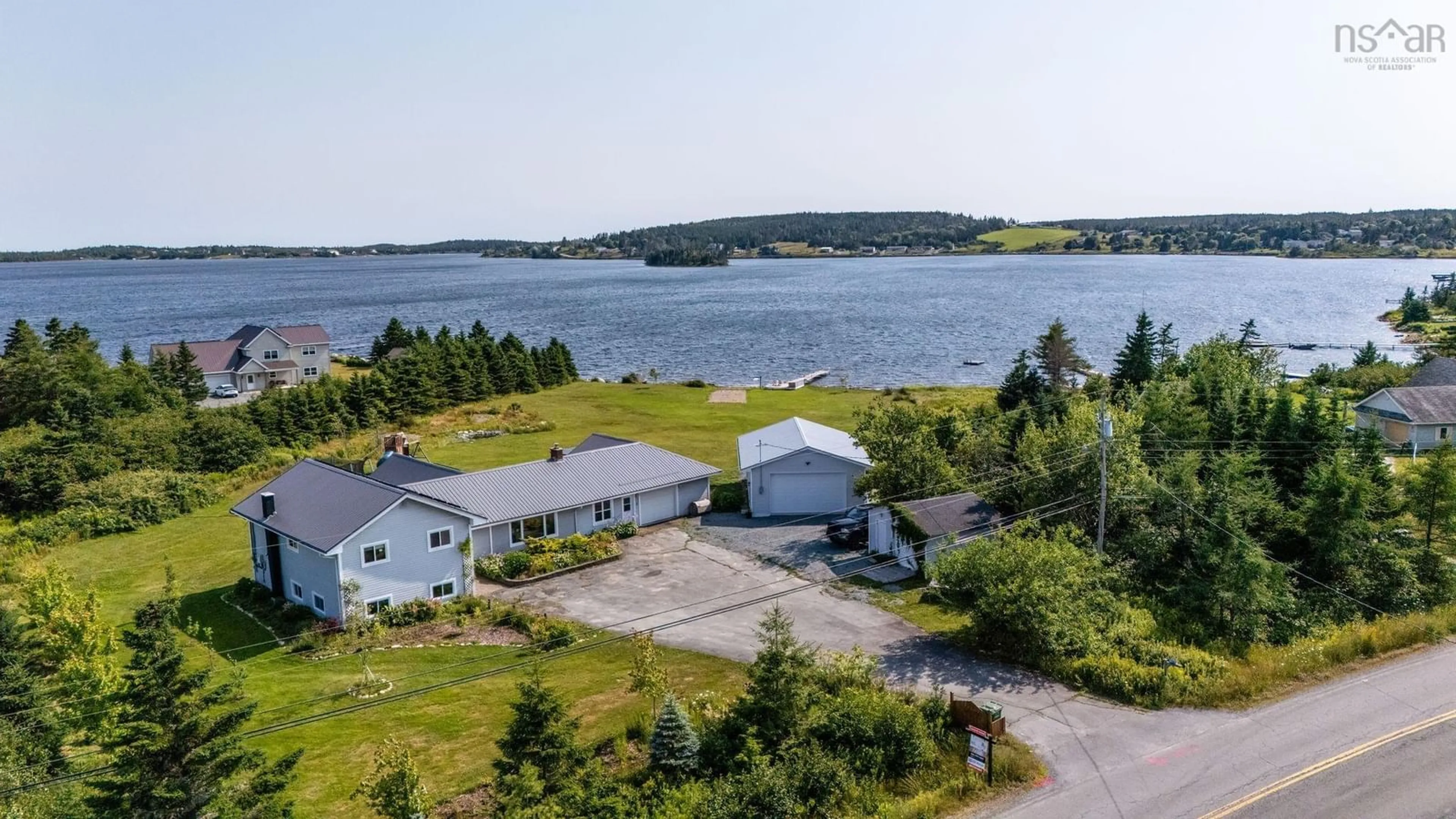 A pic from outside/outdoor area/front of a property/back of a property/a pic from drone, water/lake/river/ocean view for 1870 Crowell Rd, East Lawrencetown Nova Scotia B2Z 1N9