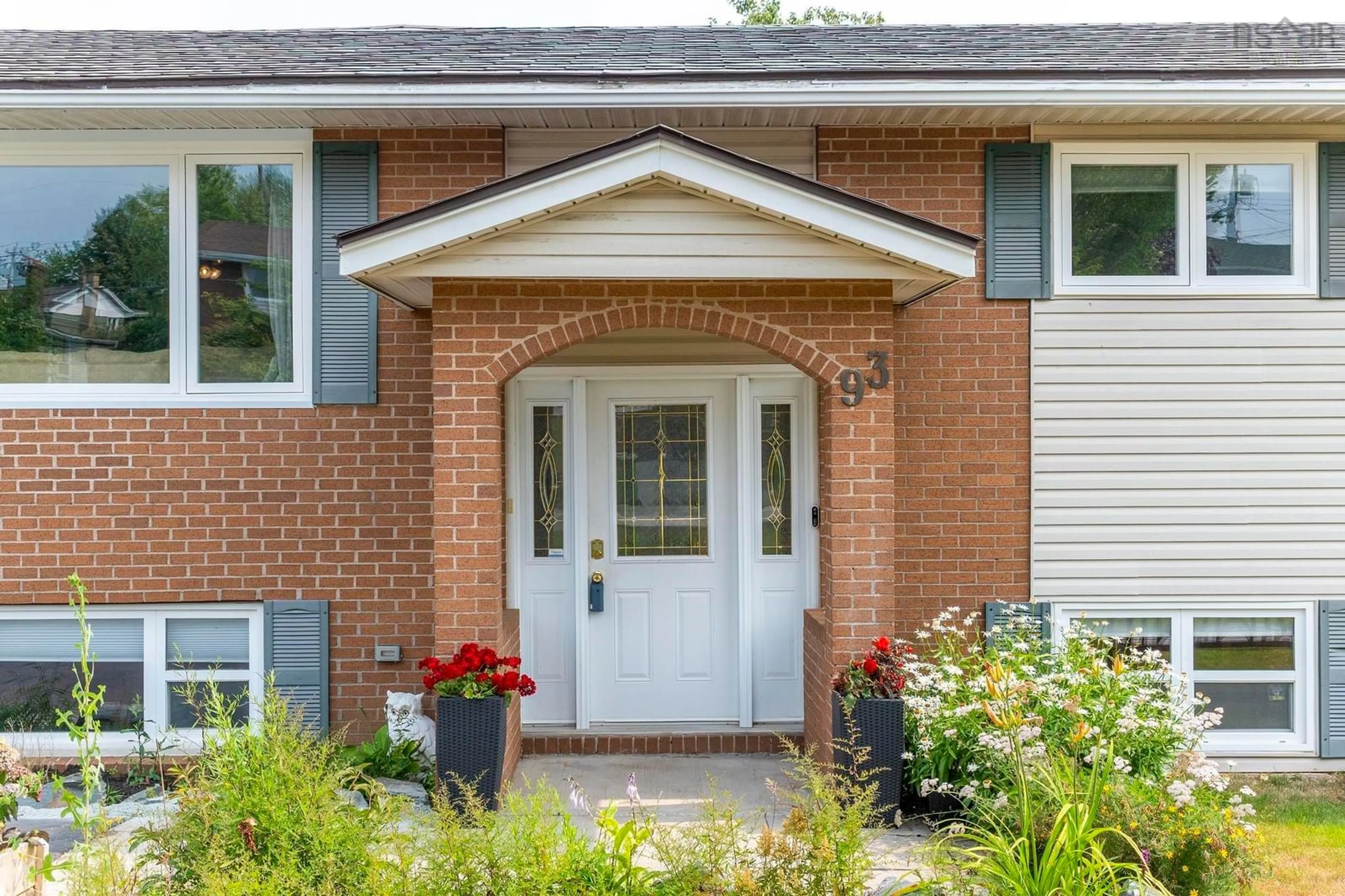 Home with brick exterior material, street for 93 Hannebury Dr, Dartmouth Nova Scotia B2V 1P7