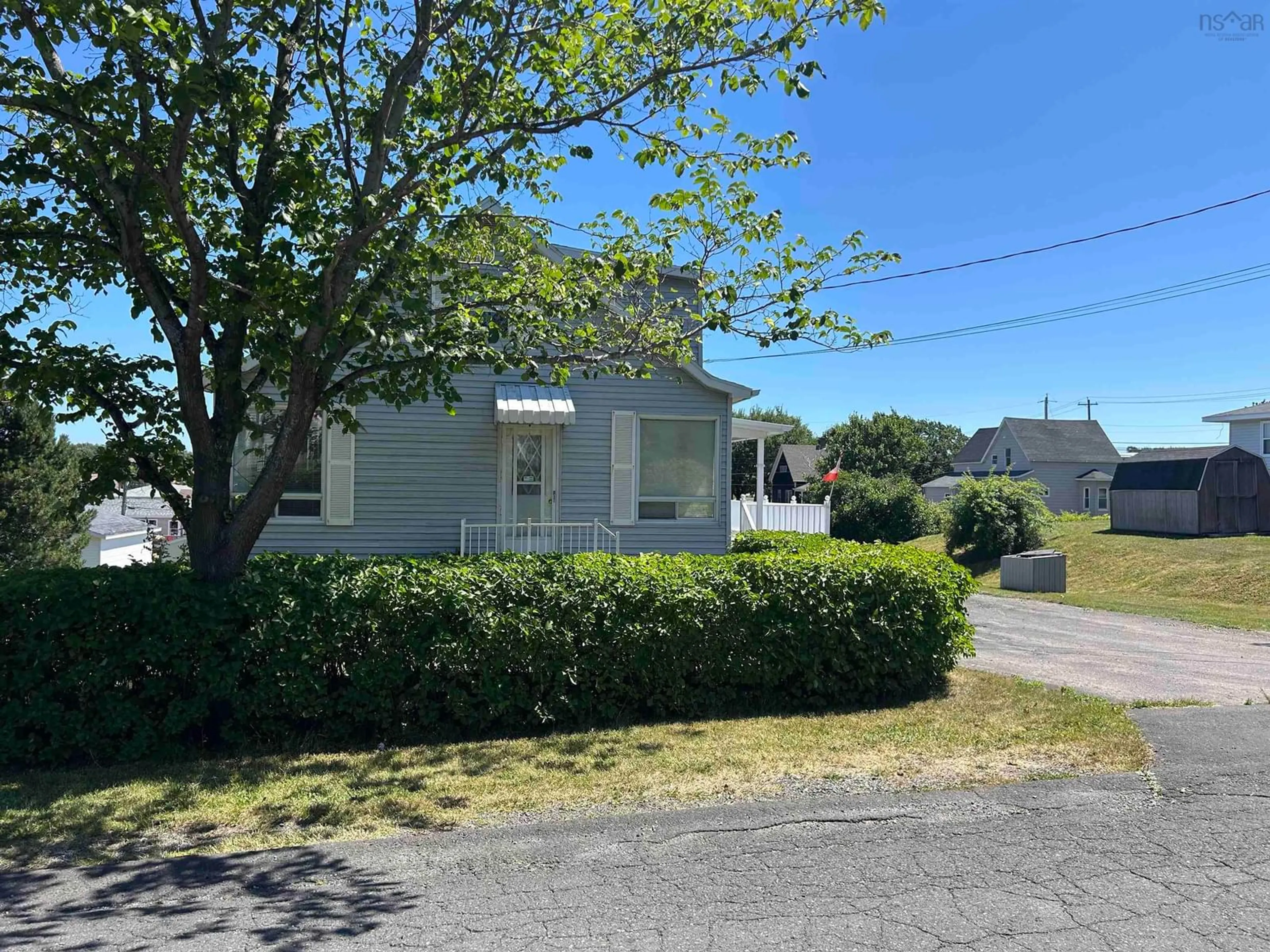 A pic from outside/outdoor area/front of a property/back of a property/a pic from drone, street for 14 Cottage St, Dominion Nova Scotia B1G 1C1