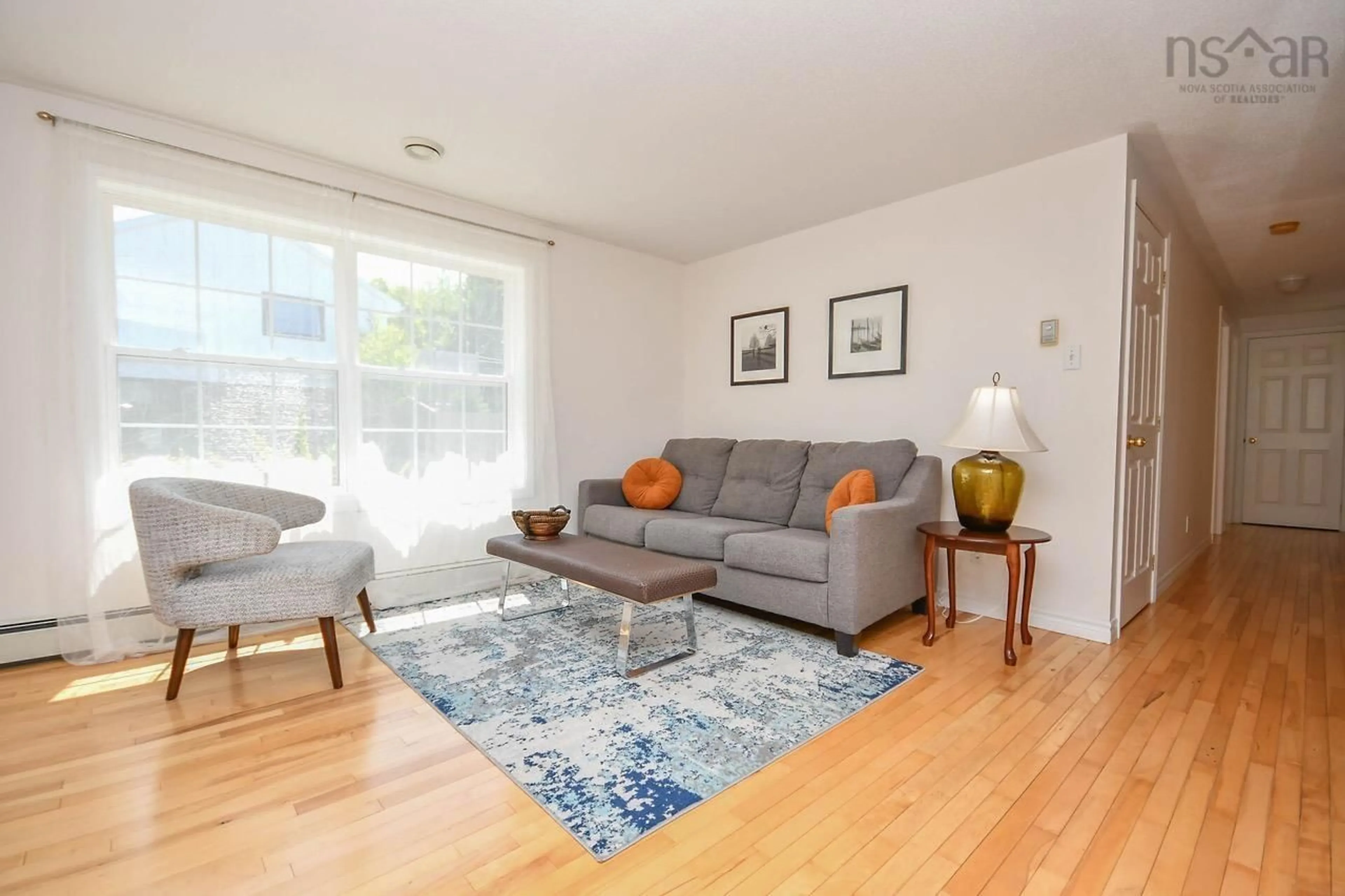 Living room with furniture, wood/laminate floor for 91 Douglas Cres, Halifax Nova Scotia B3M 3B6