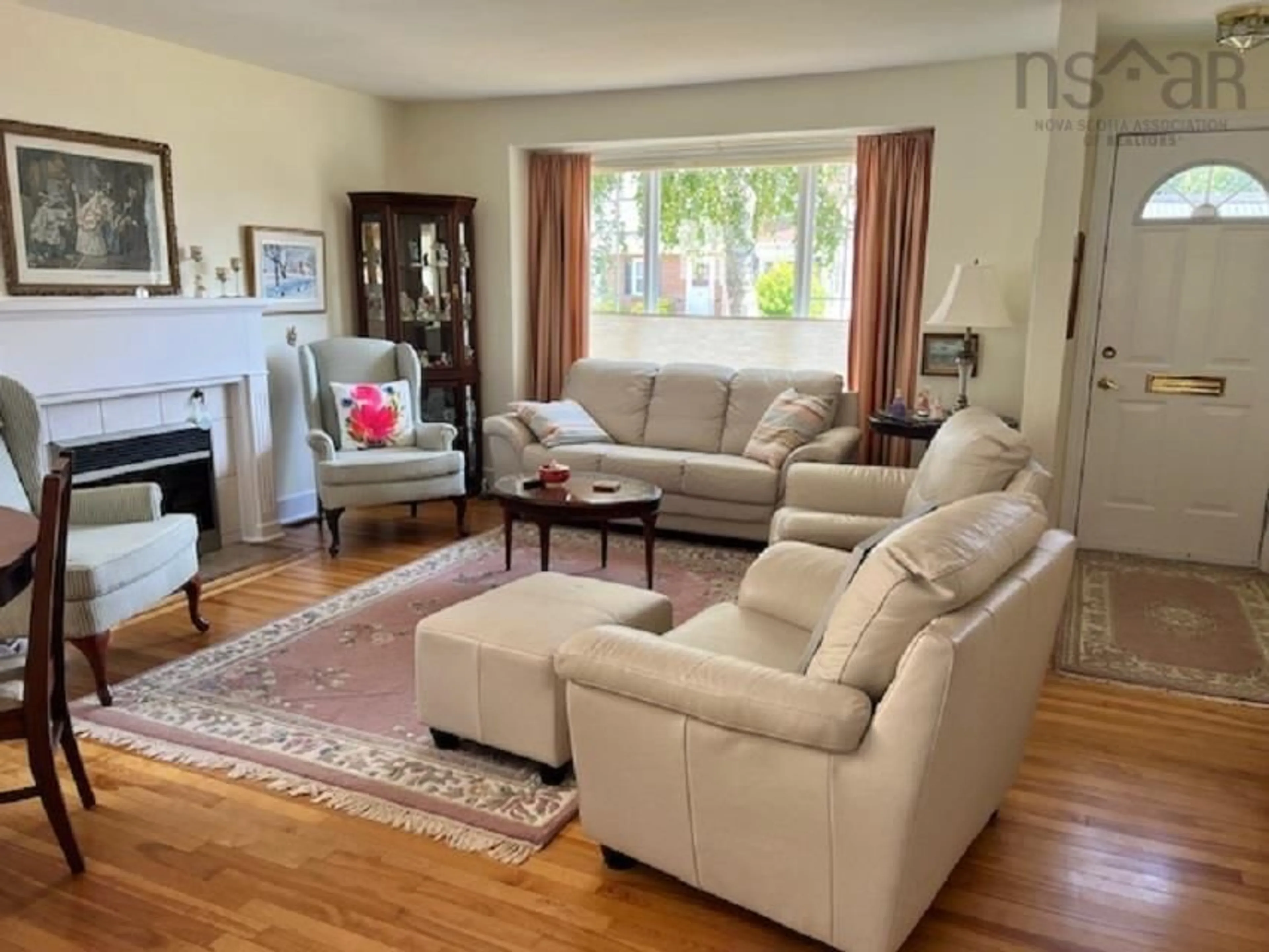 Living room with furniture, wood/laminate floor for 24 Hayward Crt, Truro Nova Scotia B2N 3C2