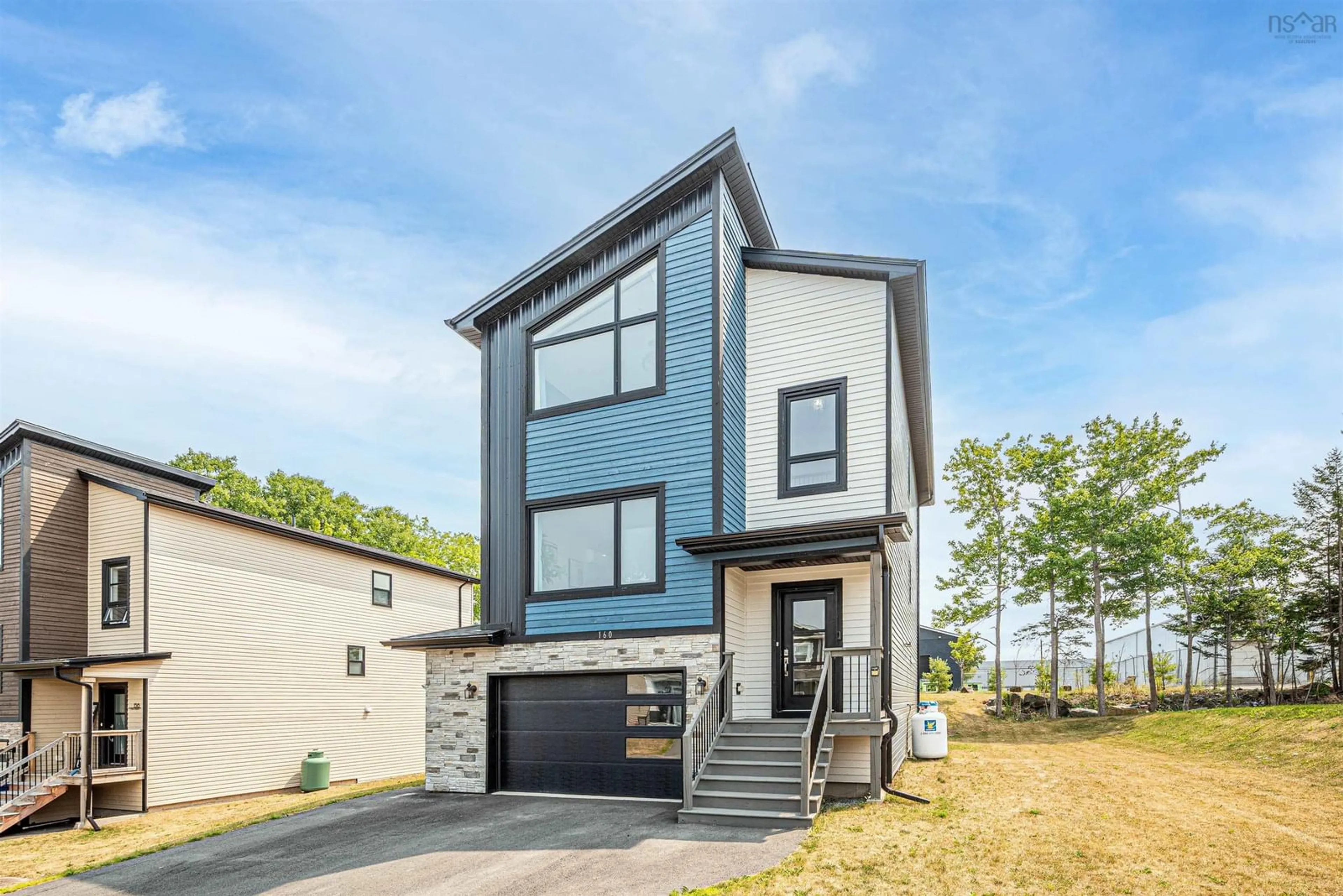 Home with vinyl exterior material, street for 160 Lewis Dr, Bedford Nova Scotia B4B 1K9