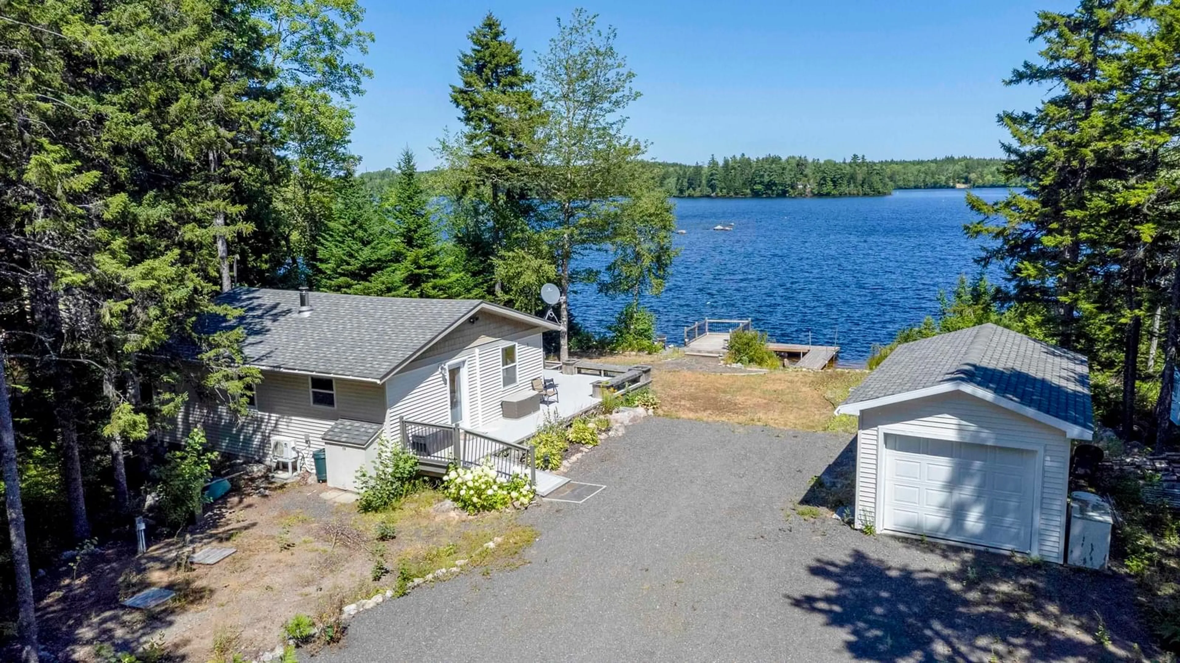 A pic from outside/outdoor area/front of a property/back of a property/a pic from drone, water/lake/river/ocean view for 146 O-3 Rd, Lake George Nova Scotia B0P 1C0