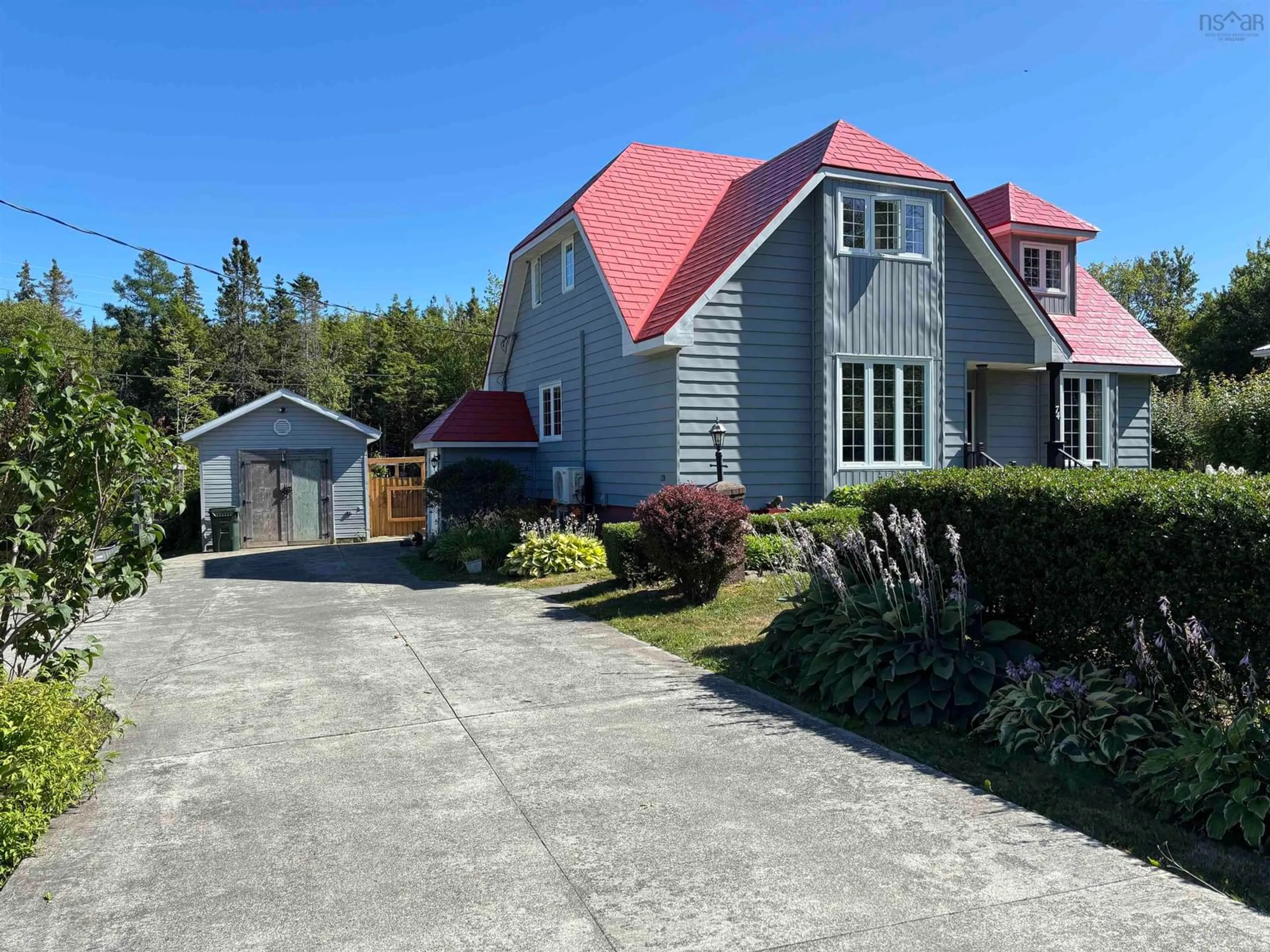 A pic from outside/outdoor area/front of a property/back of a property/a pic from drone, street for 74 Sunrise Drive, Georges River Nova Scotia B1Y 3B8