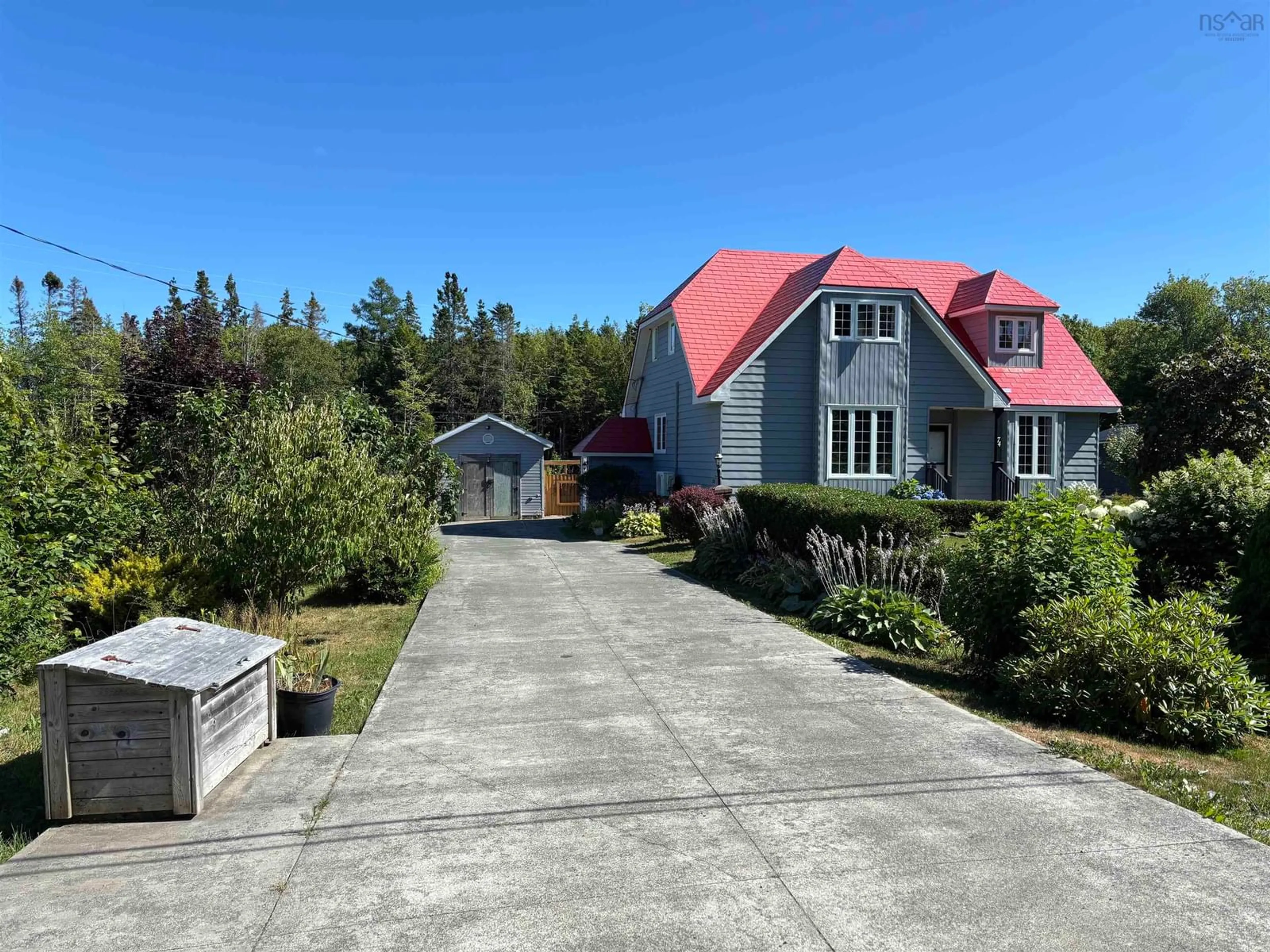 A pic from outside/outdoor area/front of a property/back of a property/a pic from drone, street for 74 Sunrise Drive, Georges River Nova Scotia B1Y 3B8