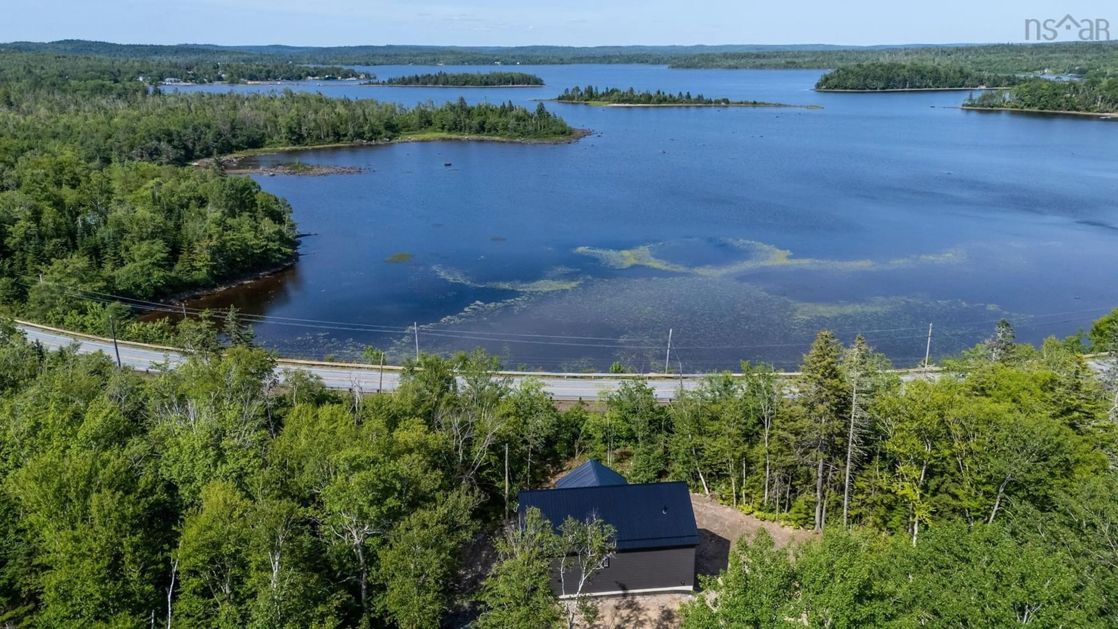 A pic from outside/outdoor area/front of a property/back of a property/a pic from drone, water/lake/river/ocean view for 67 Birchview Dr, Lake Charlotte Nova Scotia B0J 2L0