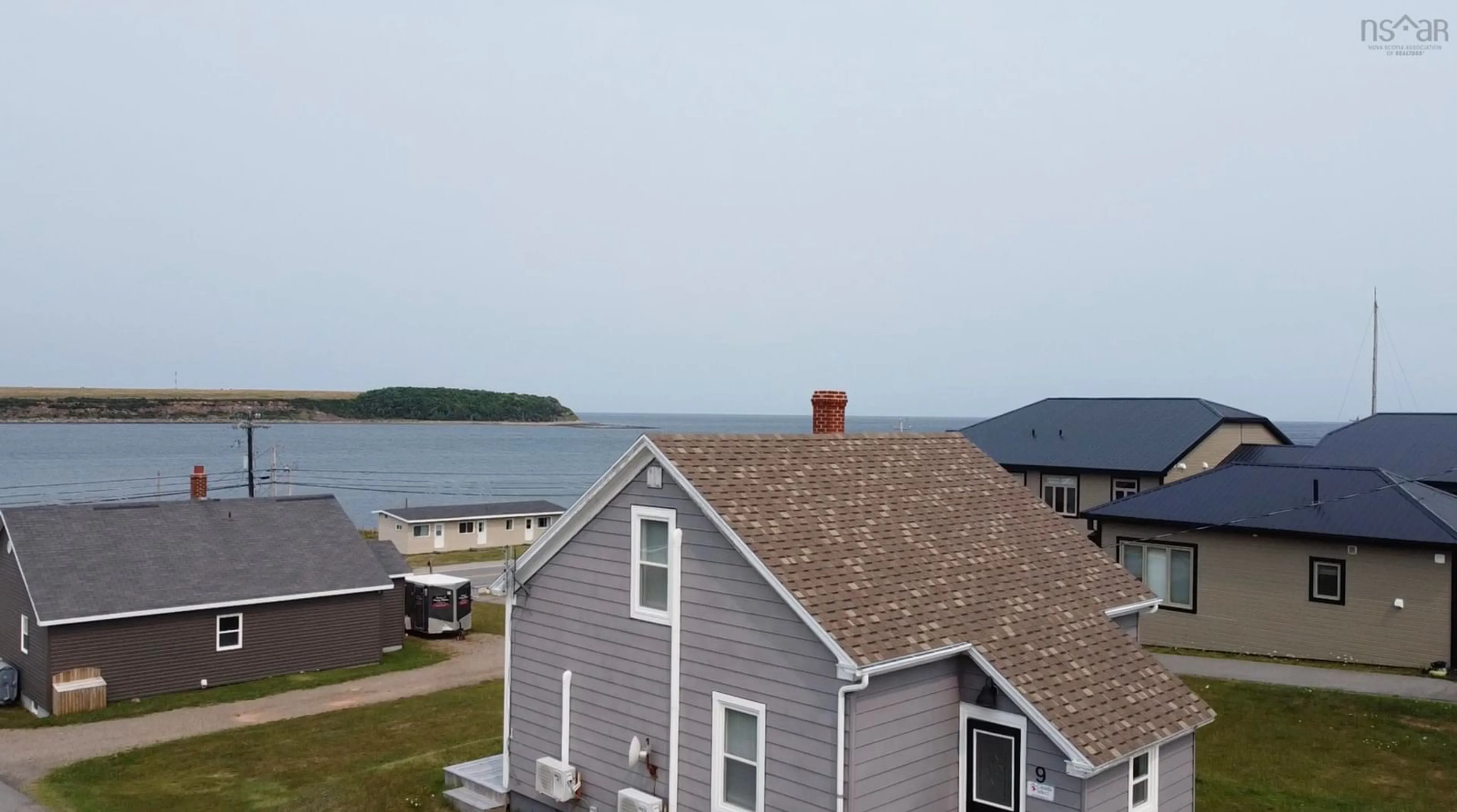 A pic from outside/outdoor area/front of a property/back of a property/a pic from drone, water/lake/river/ocean view for 9 Chemin De Susanne Rd, Chéticamp Nova Scotia B0E 1H0
