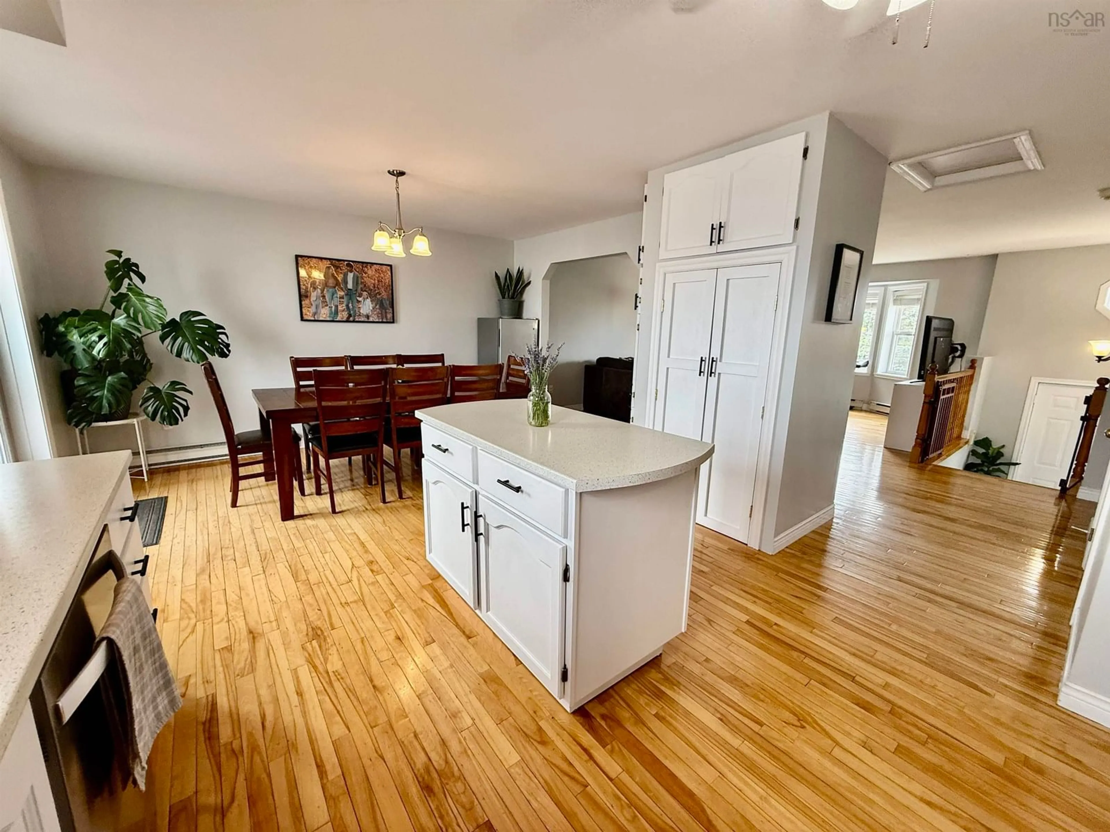 Open concept kitchen, wood/laminate floor for 1 Kohar Crt, Eastern Passage Nova Scotia B3G 1N6