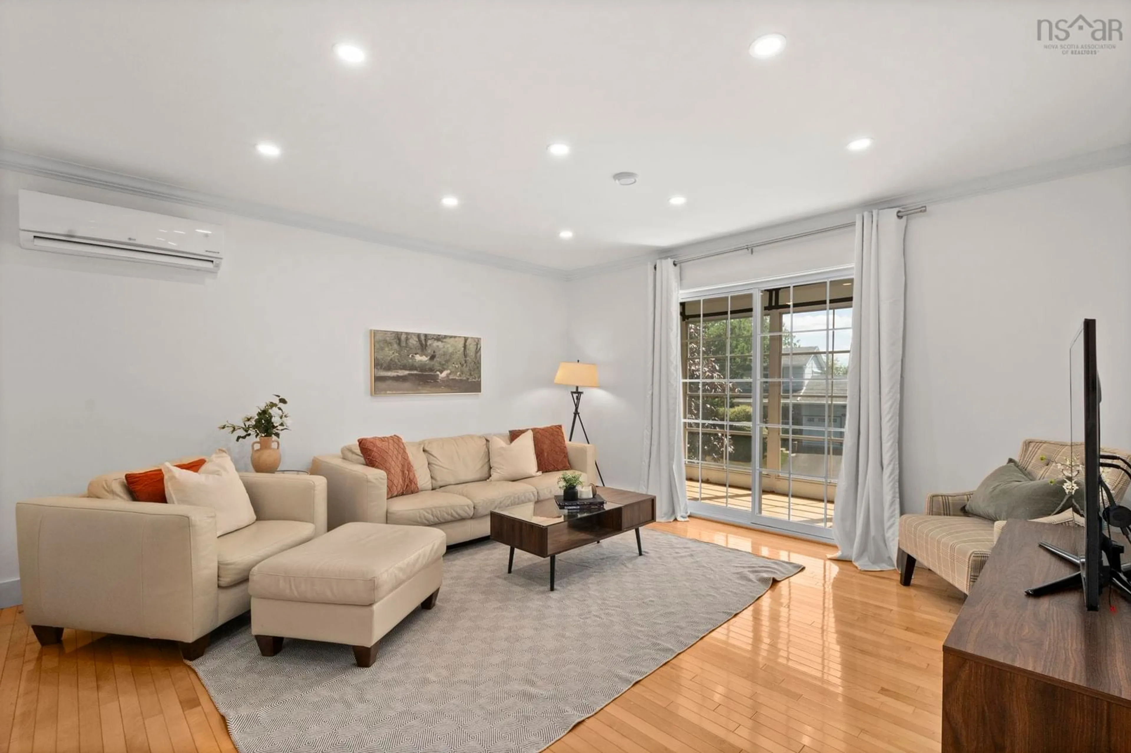 Living room with furniture, wood/laminate floor for 28 Horizon Rd, Bedford Nova Scotia B4A 3N1