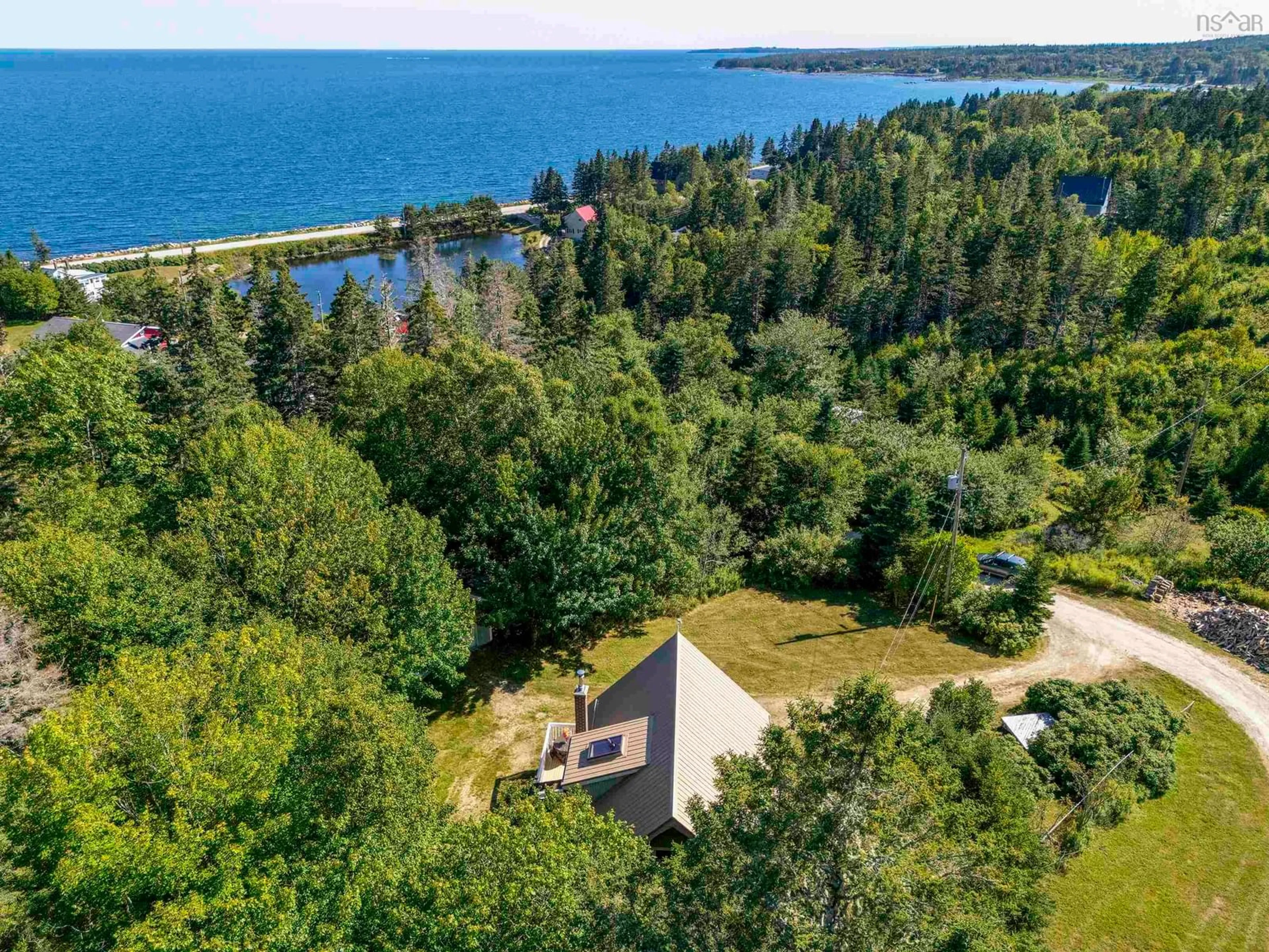 A pic from outside/outdoor area/front of a property/back of a property/a pic from drone, water/lake/river/ocean view for 46 Awalts Rd, Bayswater Nova Scotia B0J 1T0