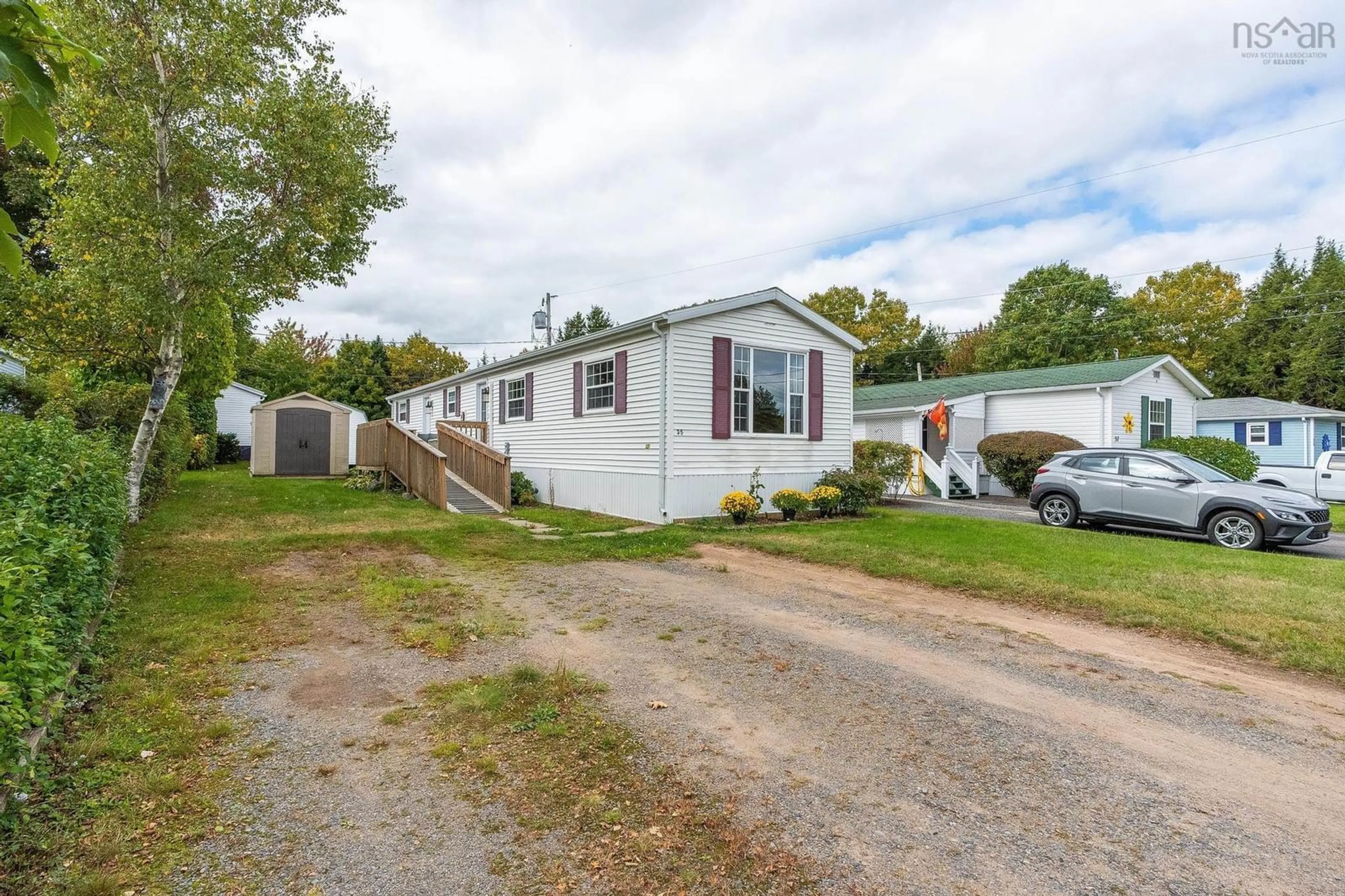 A pic from outside/outdoor area/front of a property/back of a property/a pic from drone, street for 35 Olympic Ave, New Minas Nova Scotia B4N 3T9