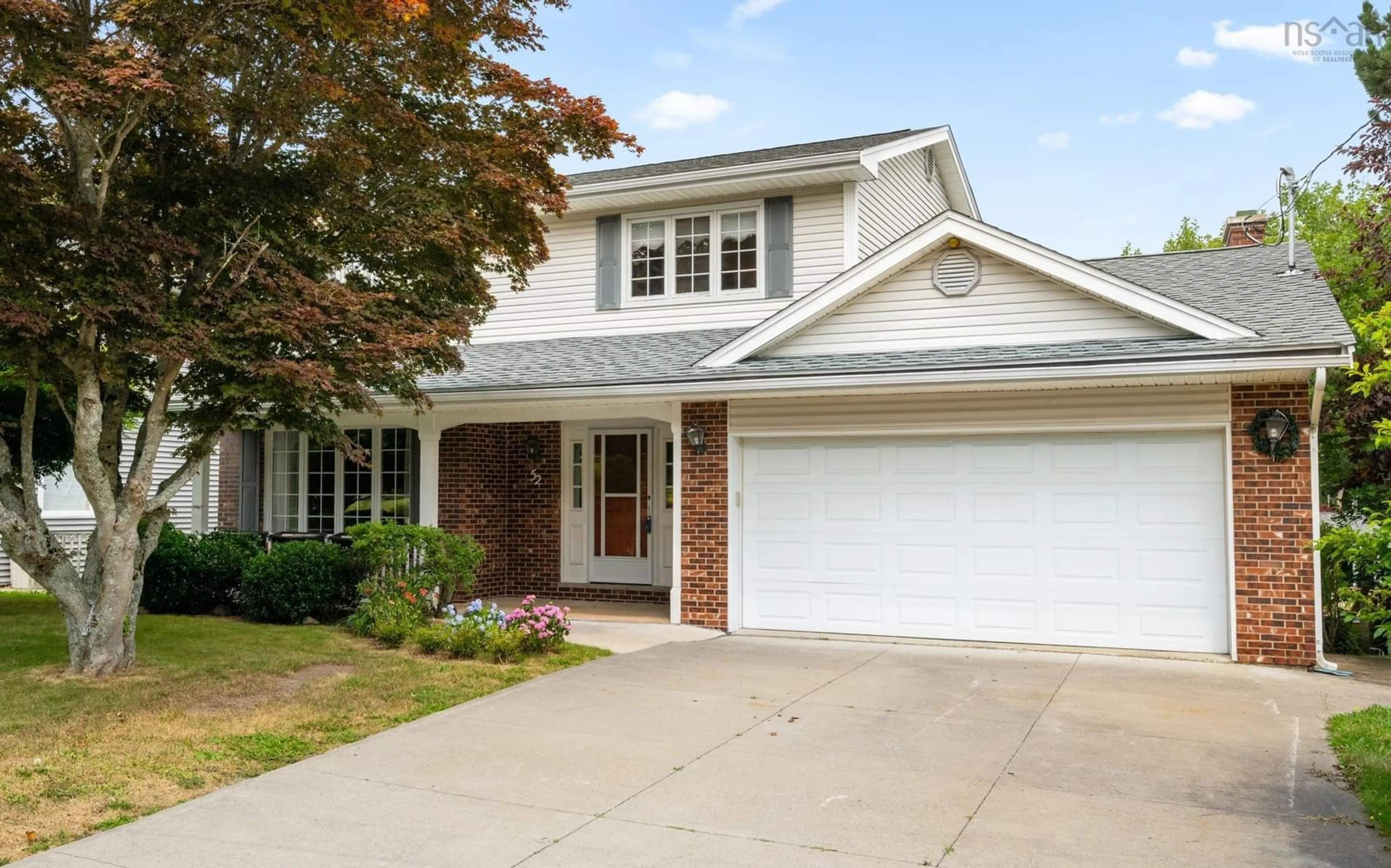 Home with vinyl exterior material, street for 52 Forest Rd, Dartmouth Nova Scotia B3A 2M5
