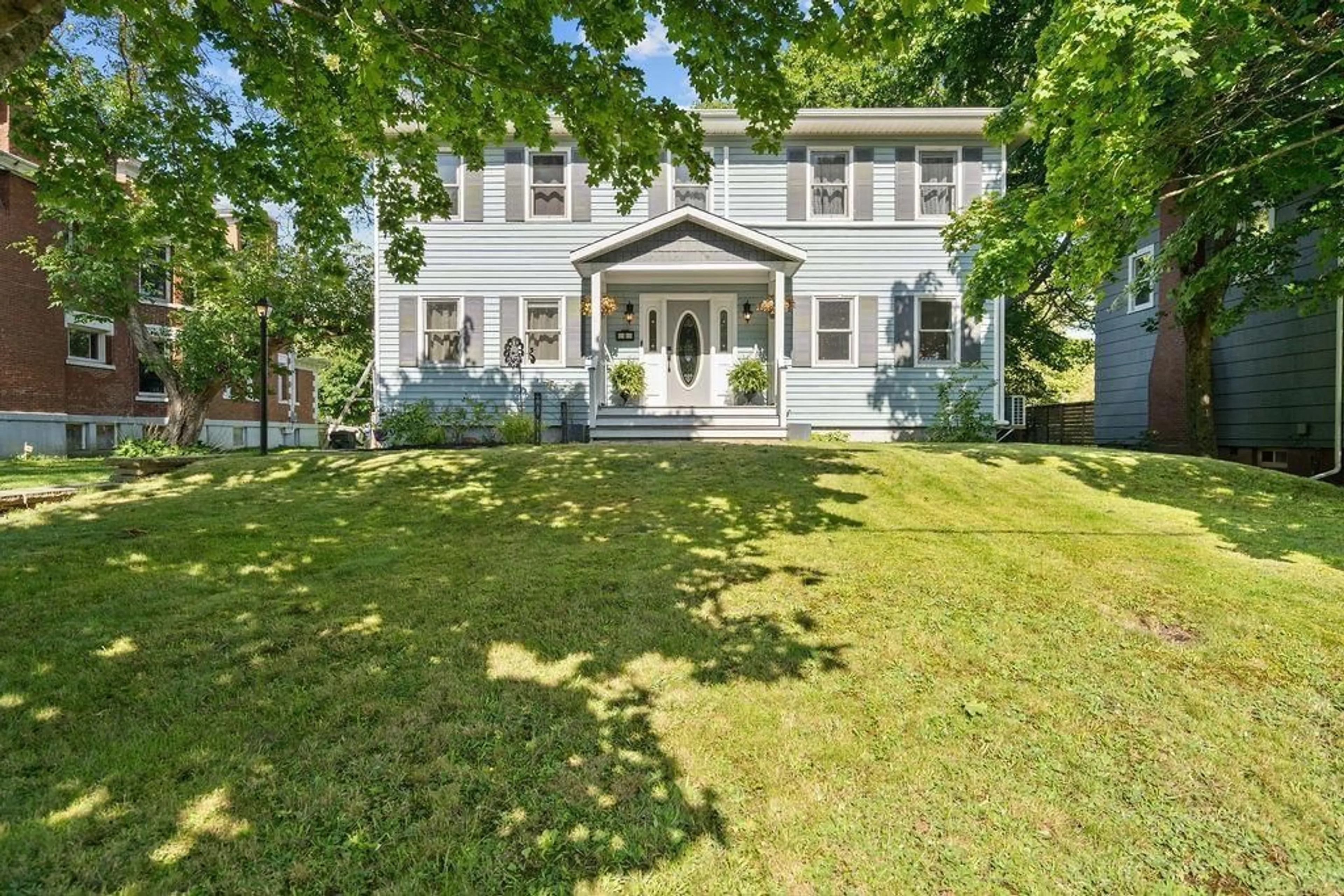 A pic from outside/outdoor area/front of a property/back of a property/a pic from drone, street for 8 Regent St, Amherst Nova Scotia B4H 4L2