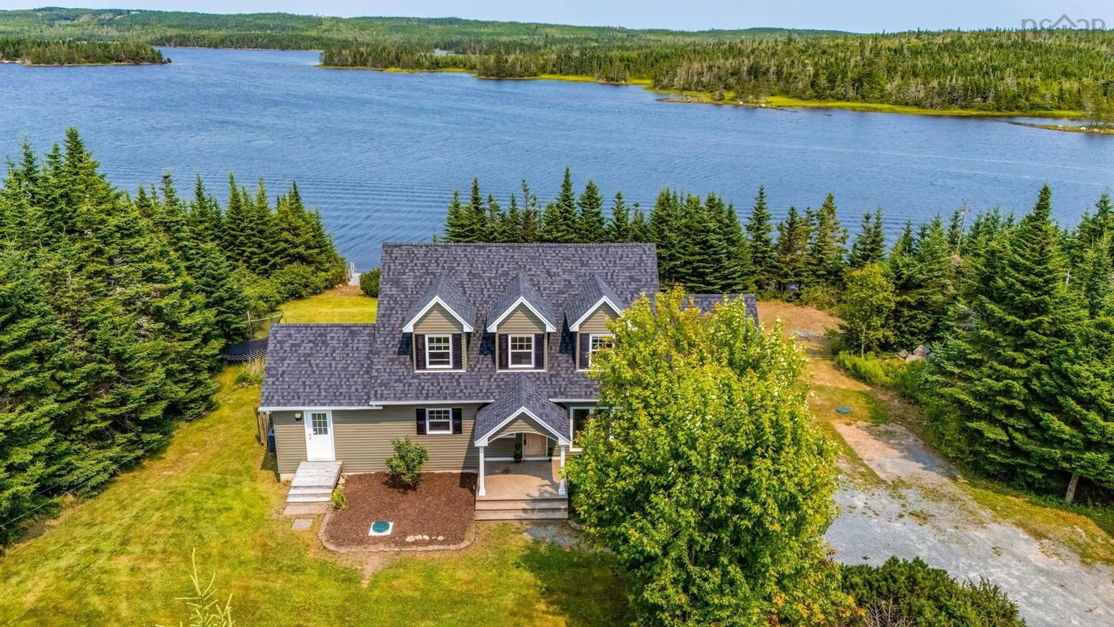 A pic from outside/outdoor area/front of a property/back of a property/a pic from drone, water/lake/river/ocean view for 88 Inverary Point Lane, West Porters Lake Nova Scotia B3E 1N4