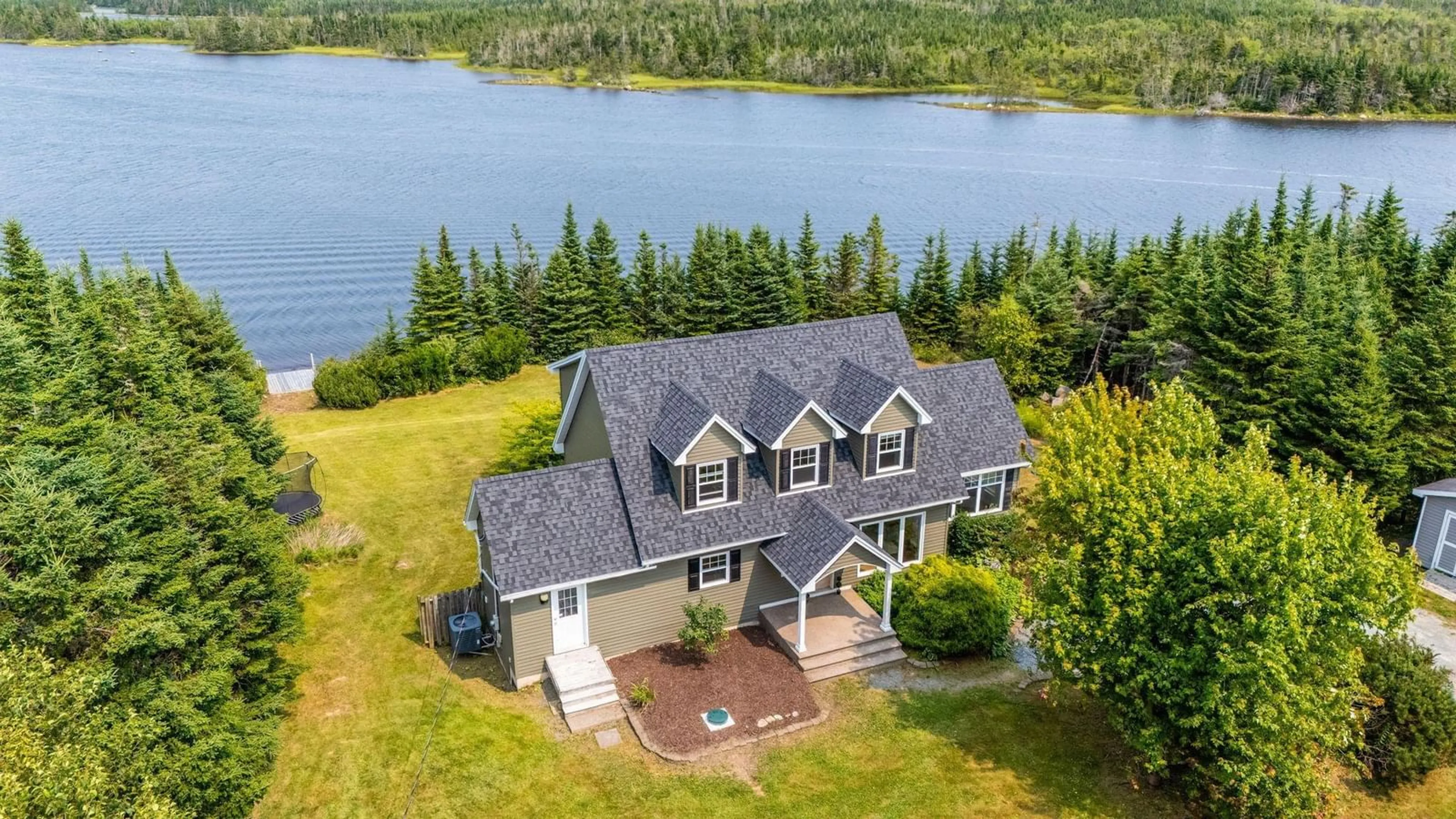 A pic from outside/outdoor area/front of a property/back of a property/a pic from drone, water/lake/river/ocean view for 88 Inverary Point Lane, West Porters Lake Nova Scotia B3E 1N4